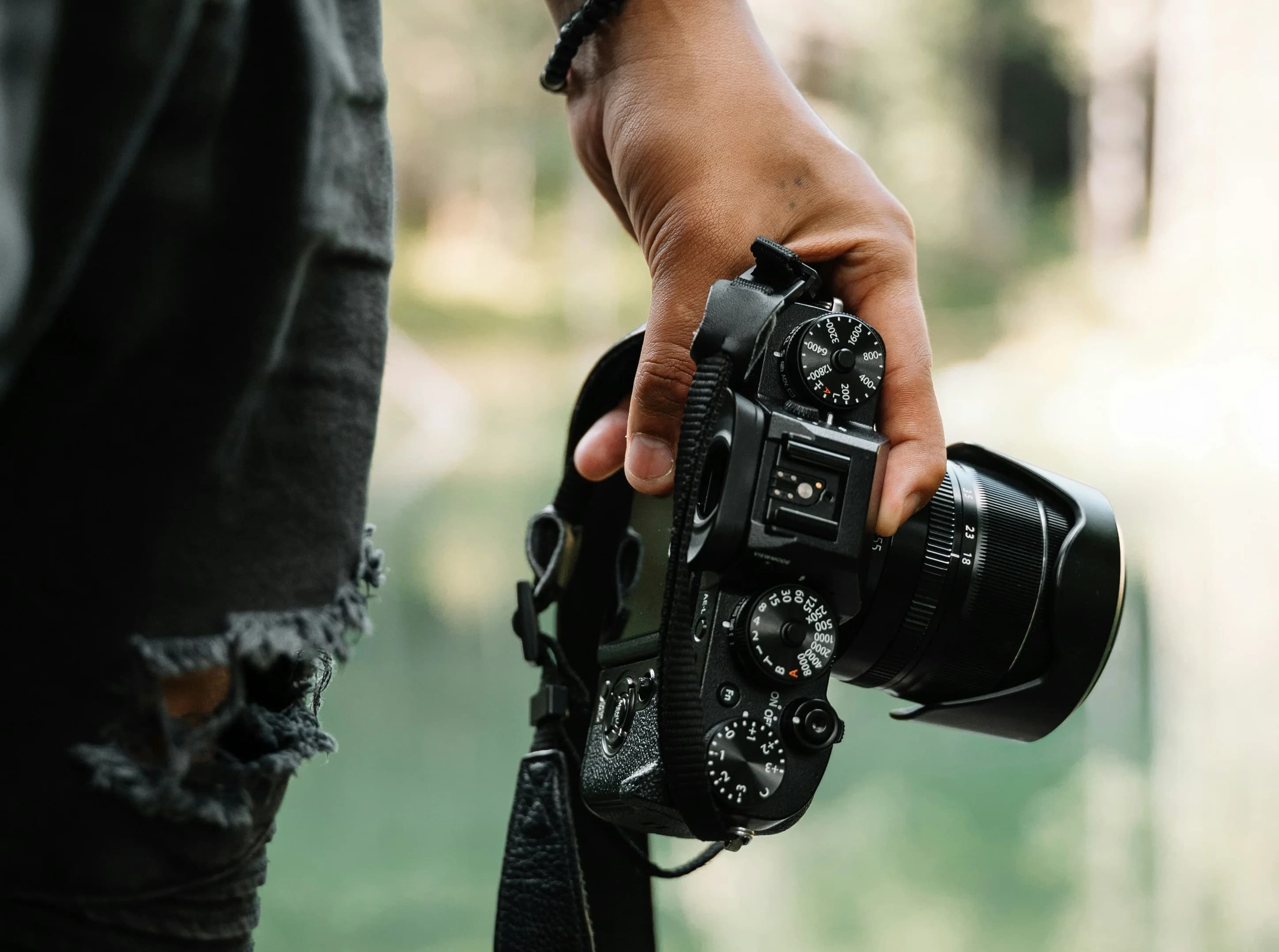 Person holding a camera