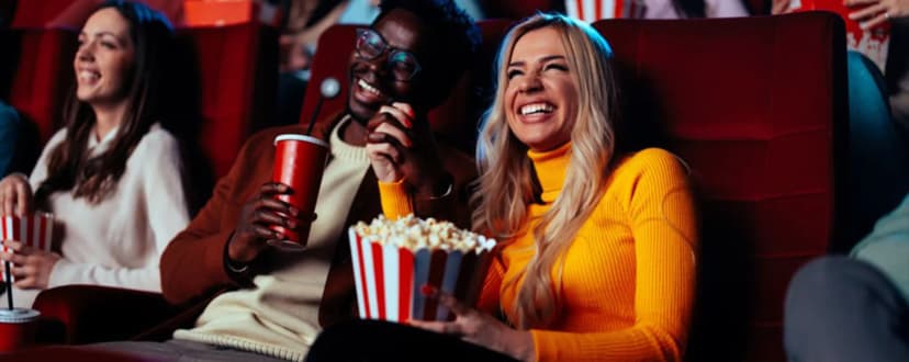 People watching a movie in a theater