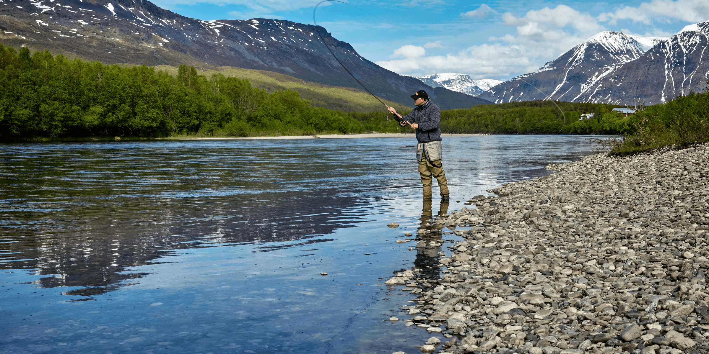 man fishing on the river