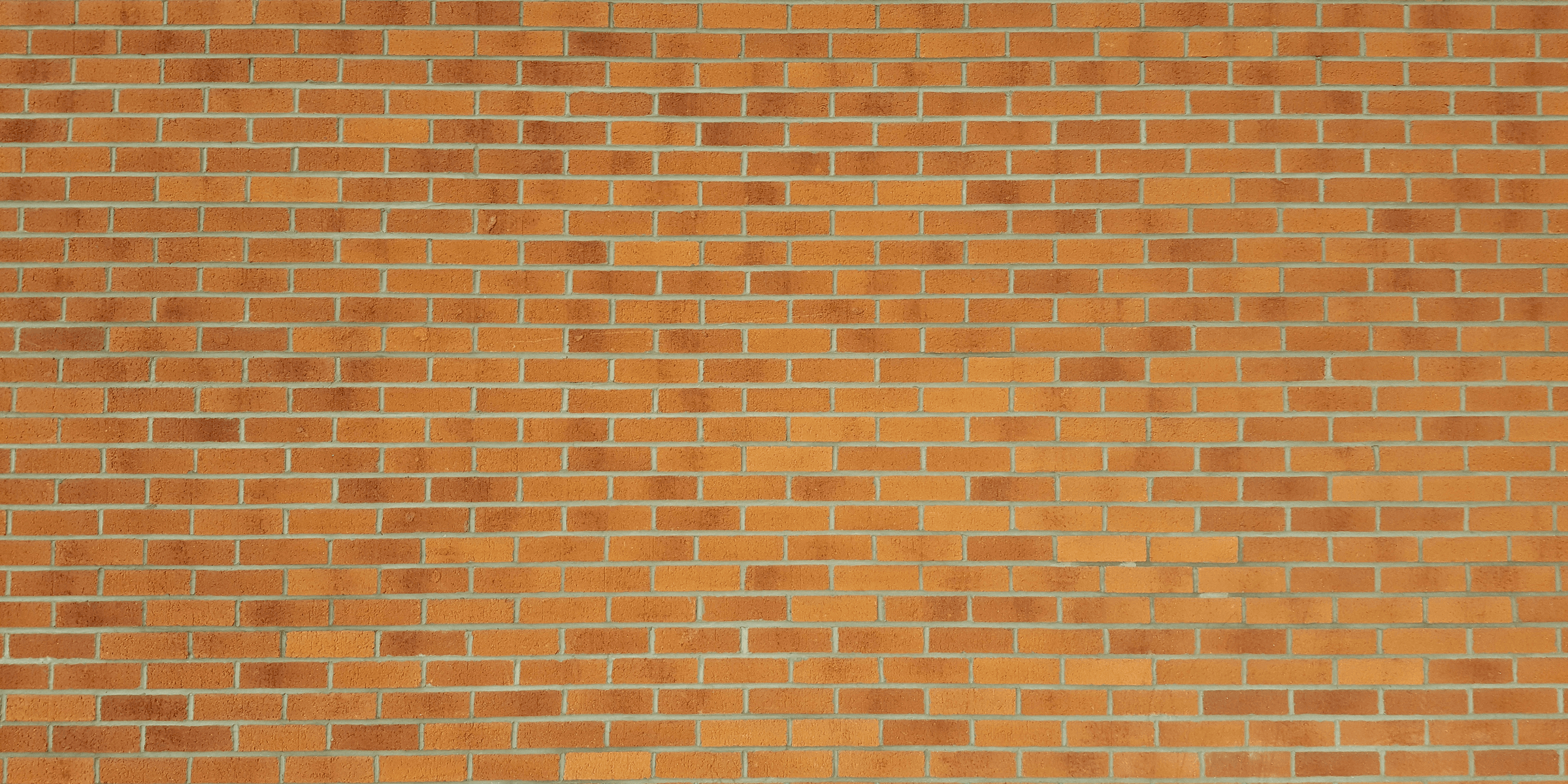 brown bricked wall.