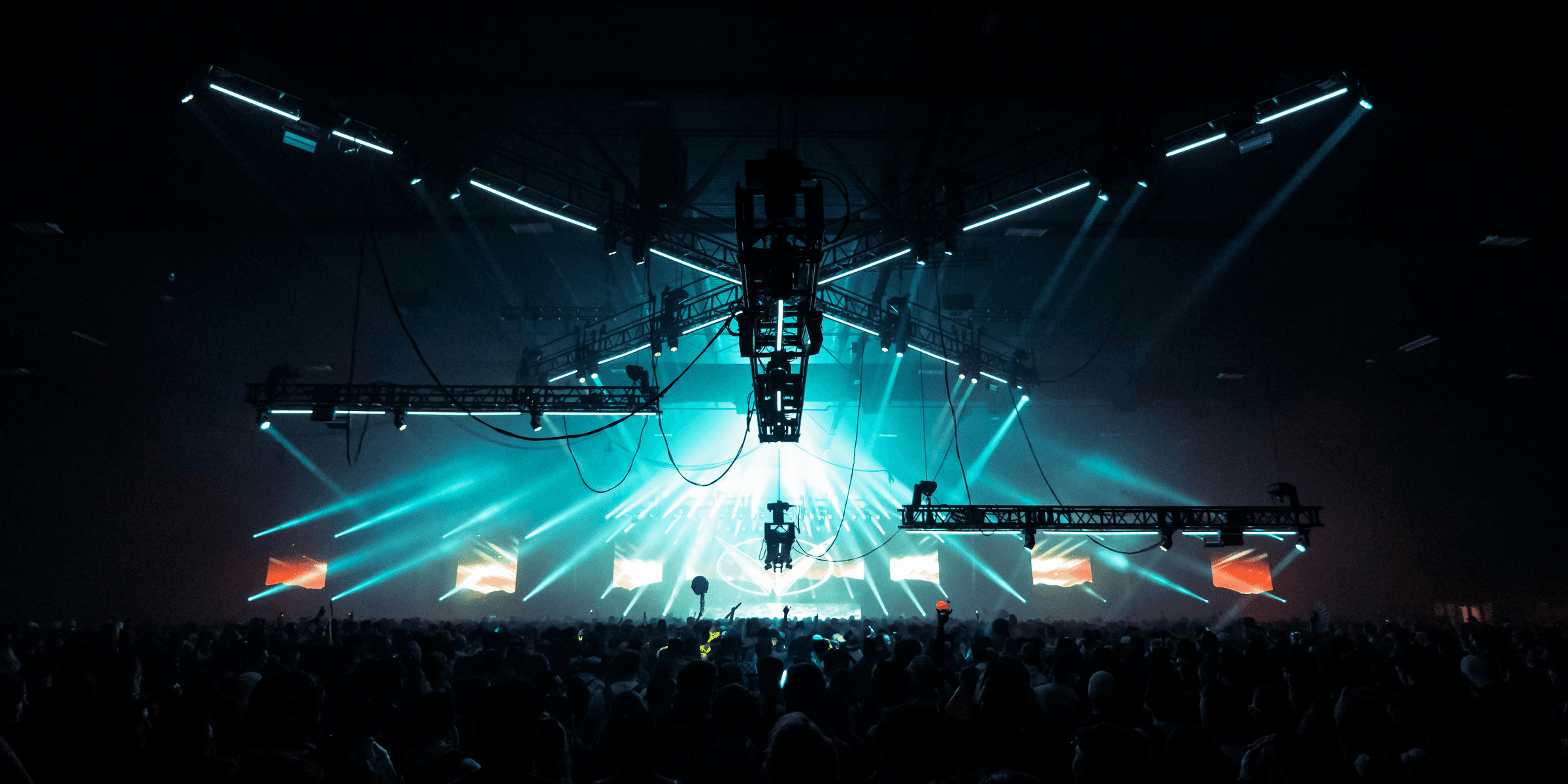 a large crowd of people at a concert.