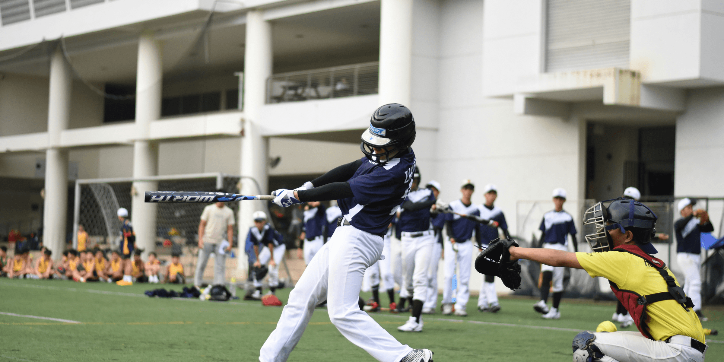 baseball players playing baseball on baseball field