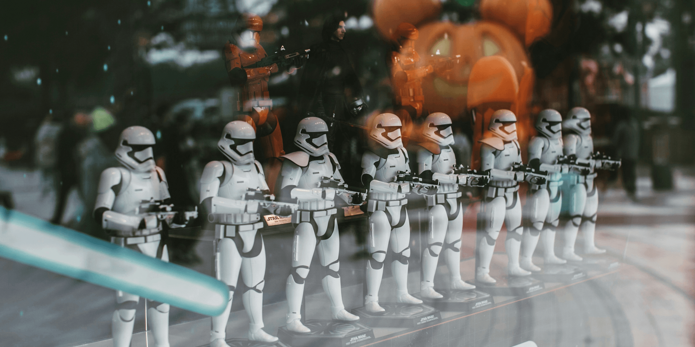 a display of star wars figurines in a store window
