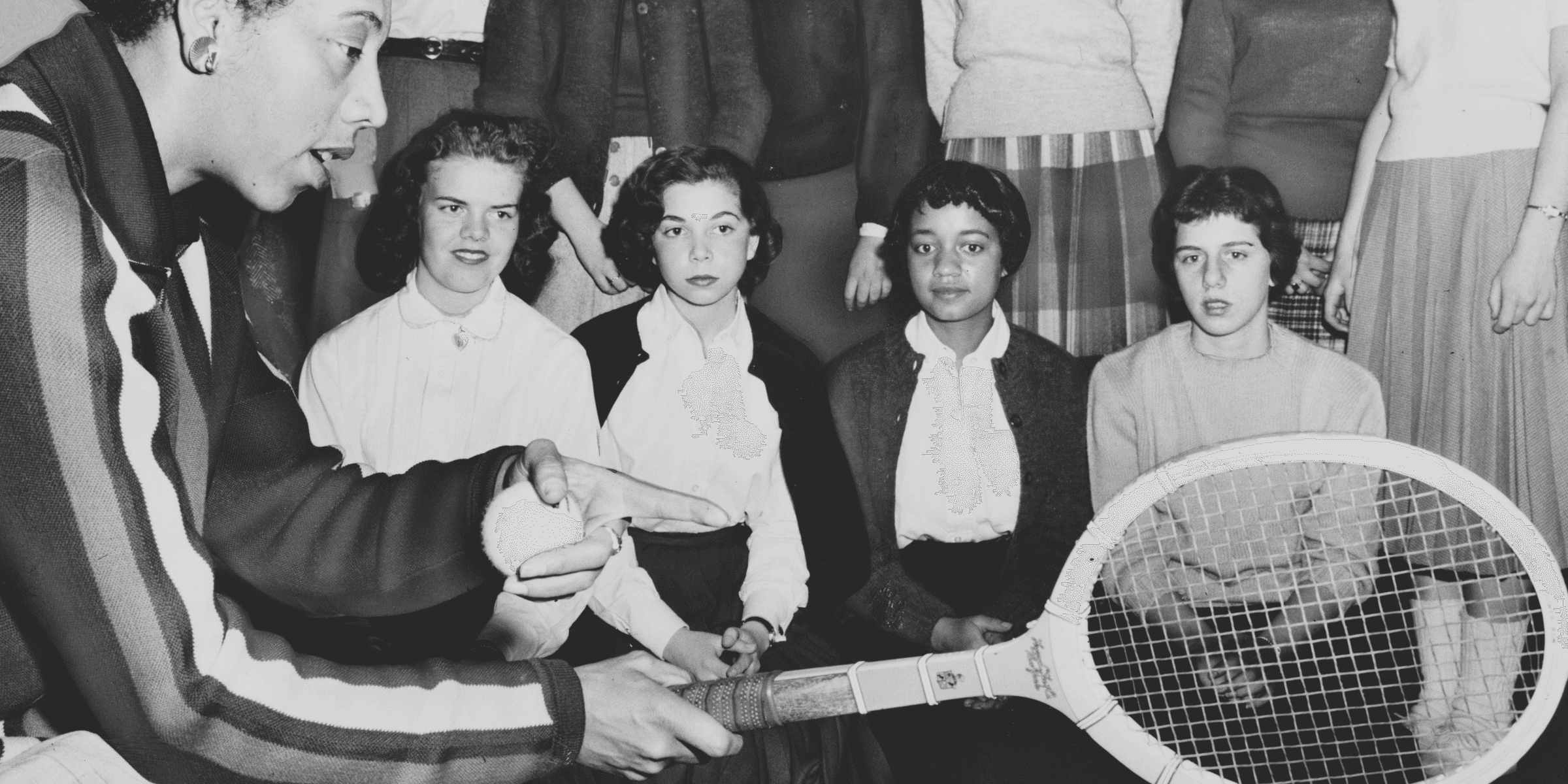 Tennis talk Althea Gibson, U.S. and Wimbledon tennis champion, gives some pointers on the game which has brought her international fame