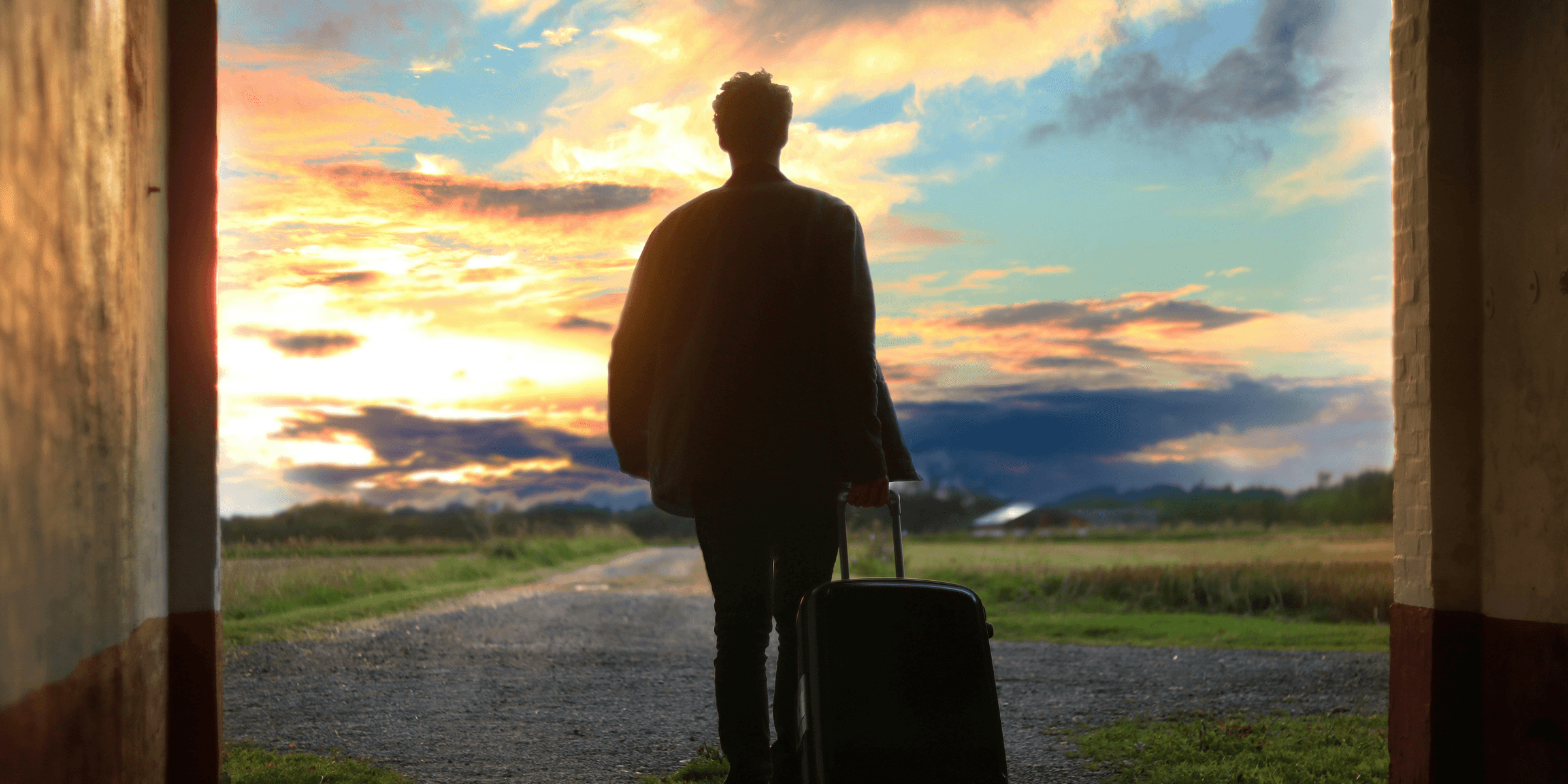 man holding luggage photo.