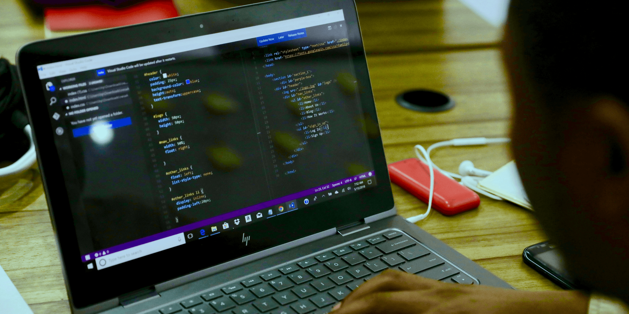 black HP laptop displaying C++ language.