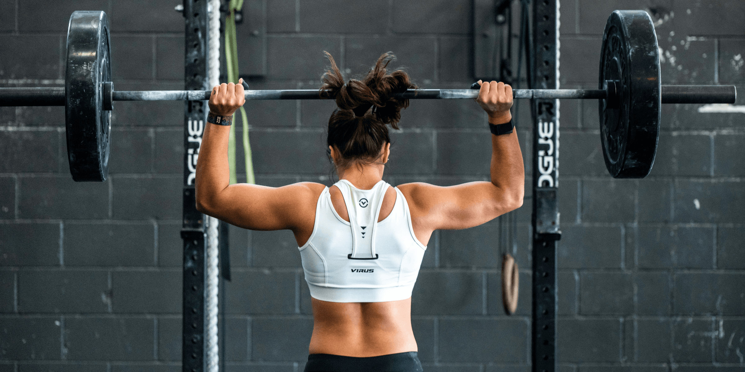 woman doing weight lifting.