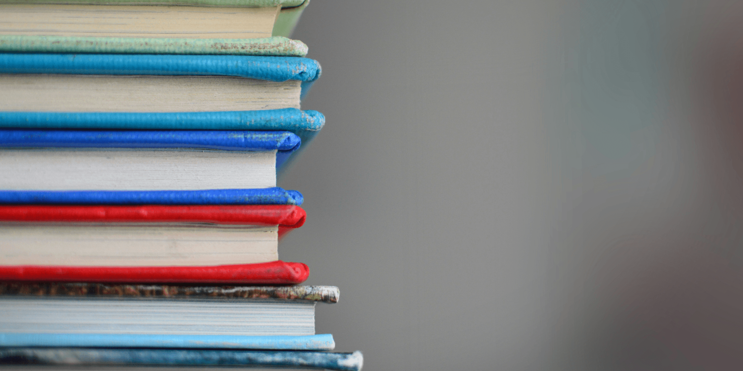 shallow focus photography of books.