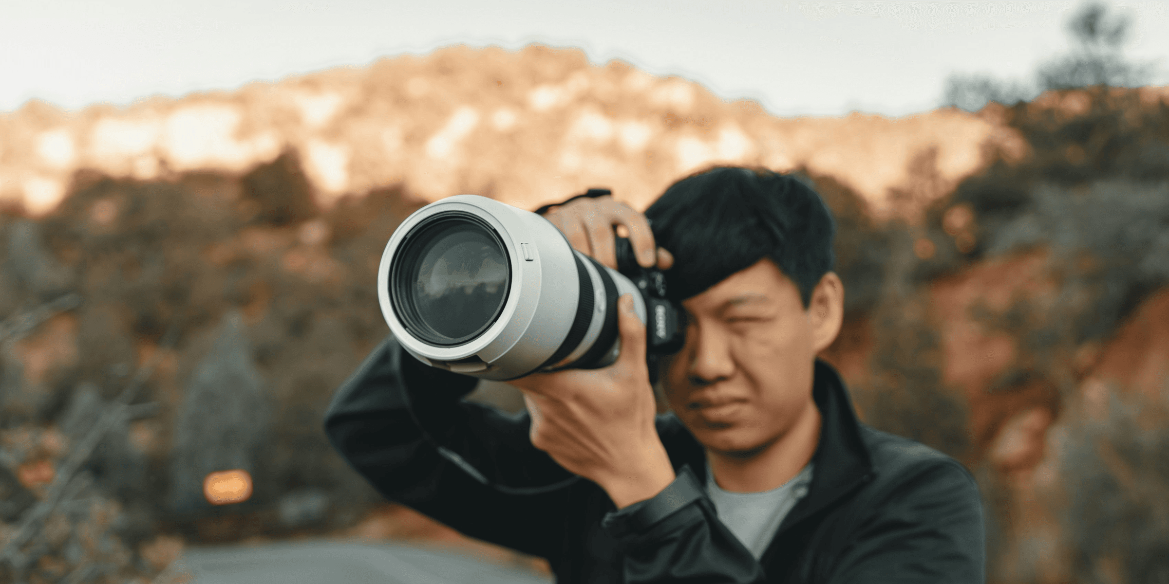 white and black DSLR camera.