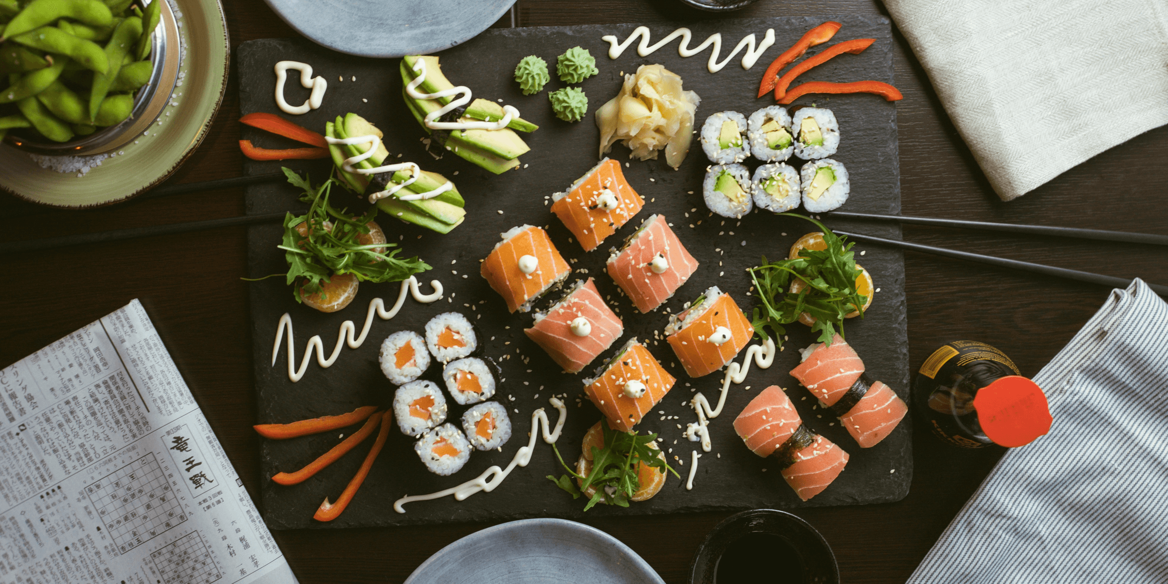 sushi on black ceramic plate.