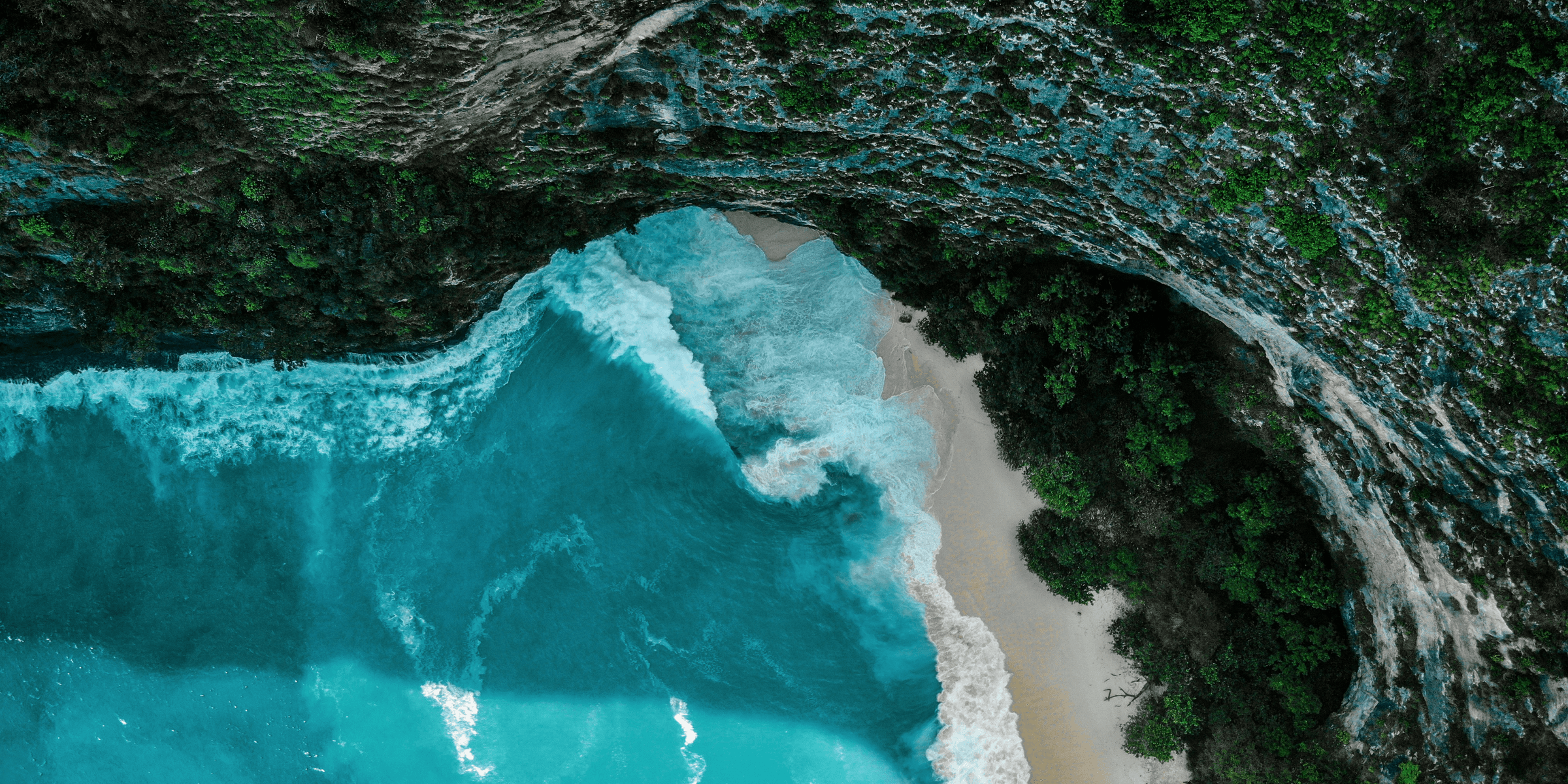 white sand beach during daytime.