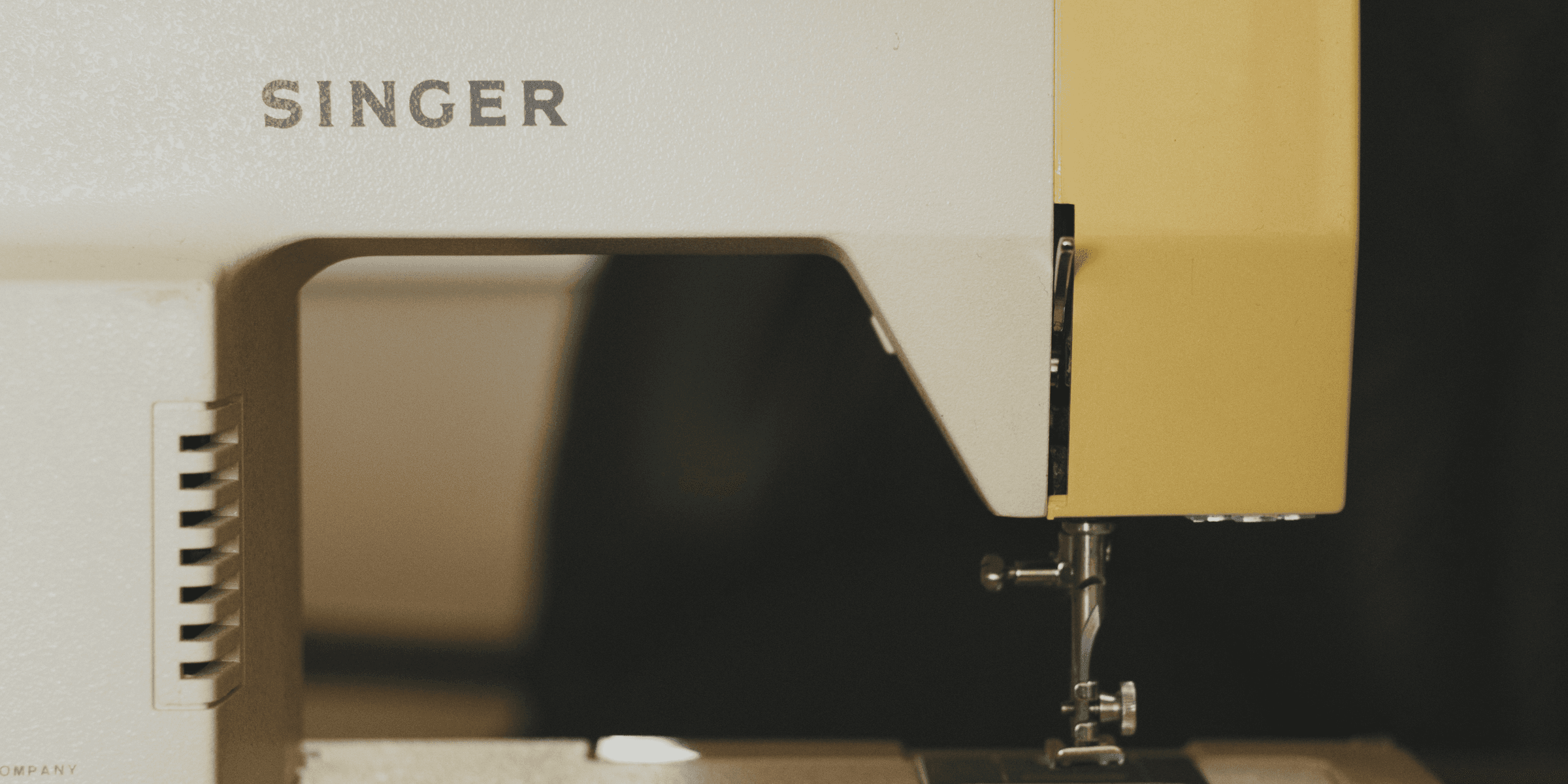 white Singer sewing machine.