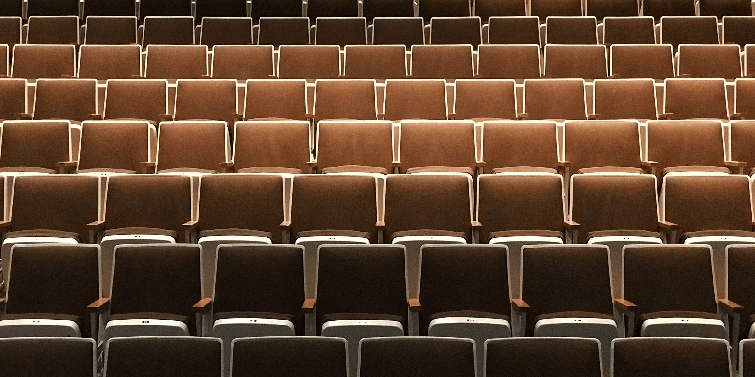empty brown theater chairs.