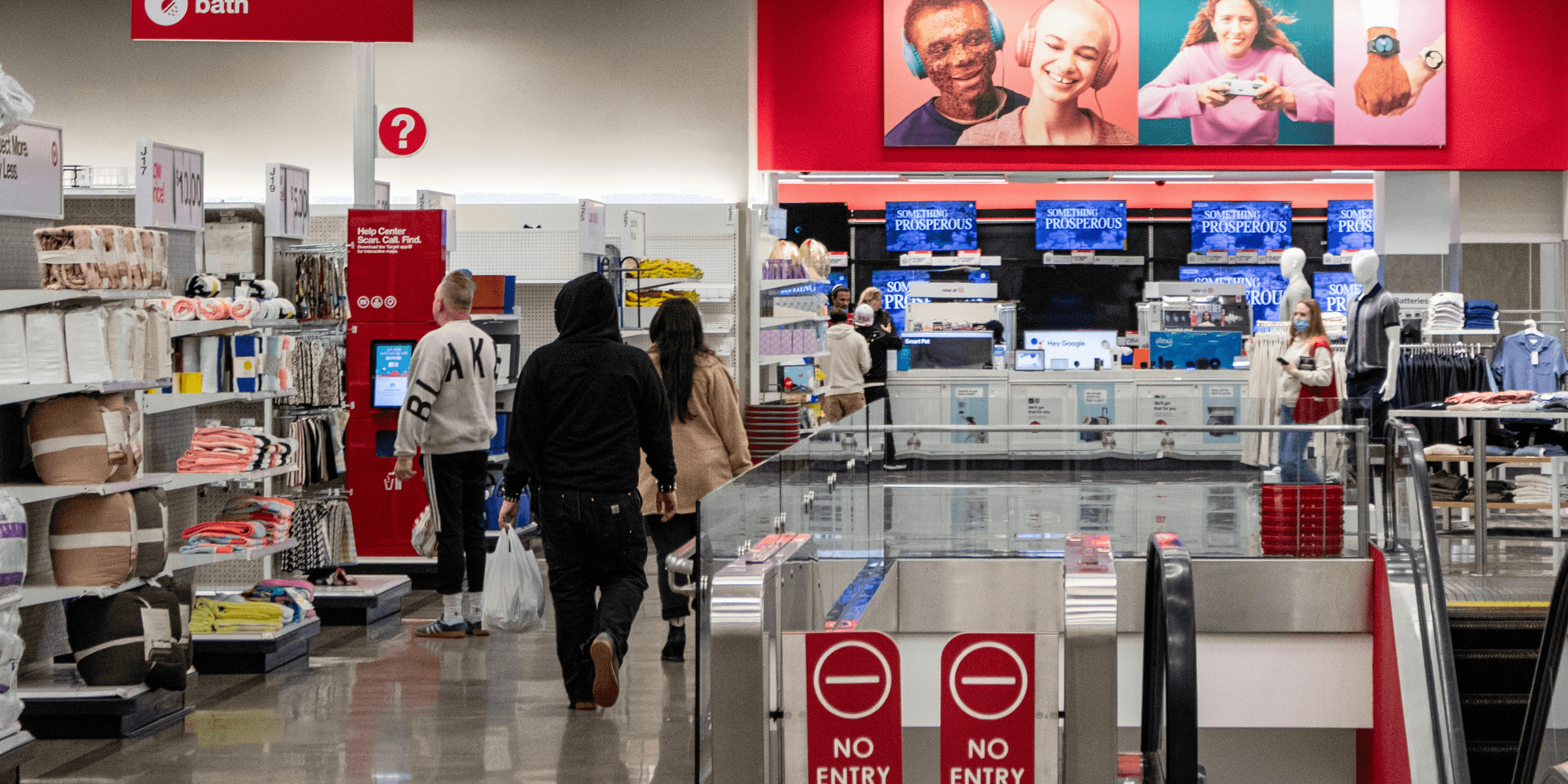 People shop in a target store aisle.