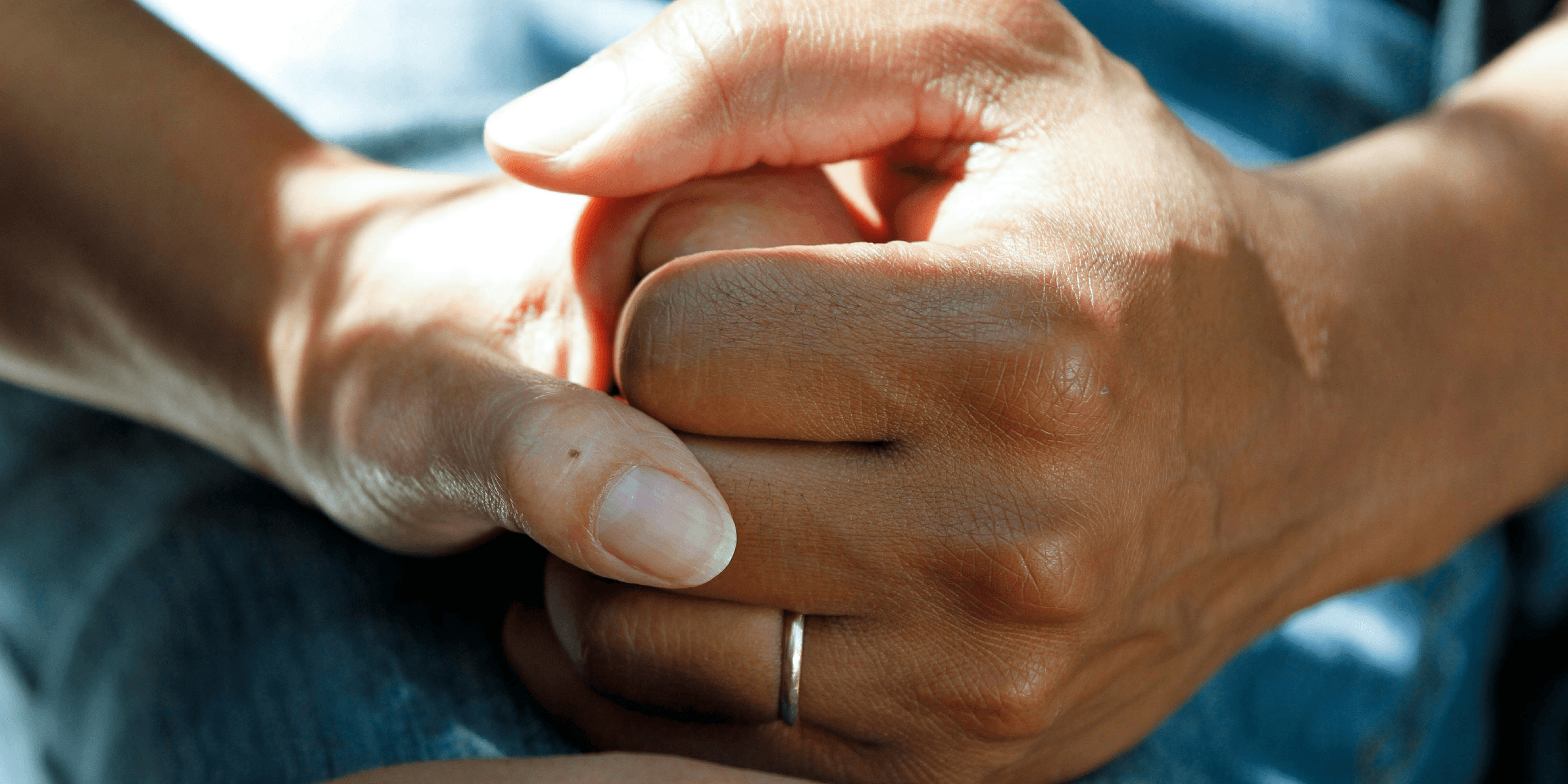 person wearing gold wedding band.