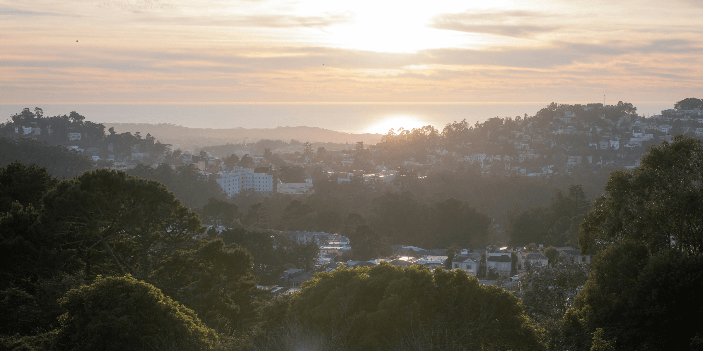 Sunrise illuminates the landscape and the sea..