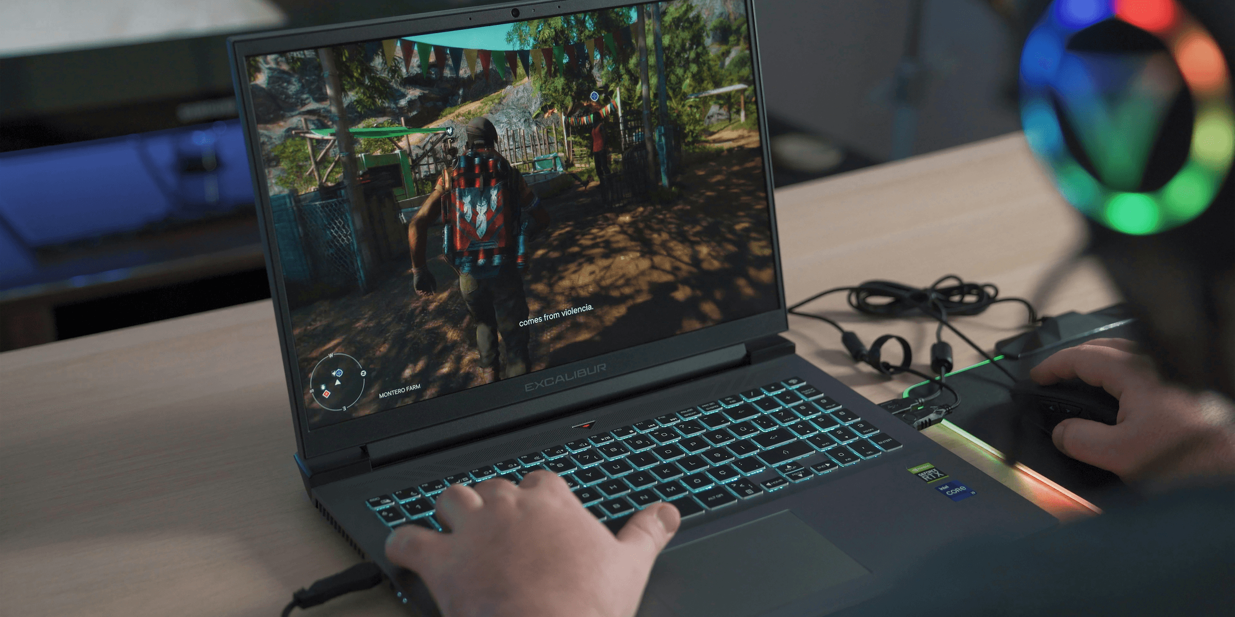 a person playing a video game on a laptop.