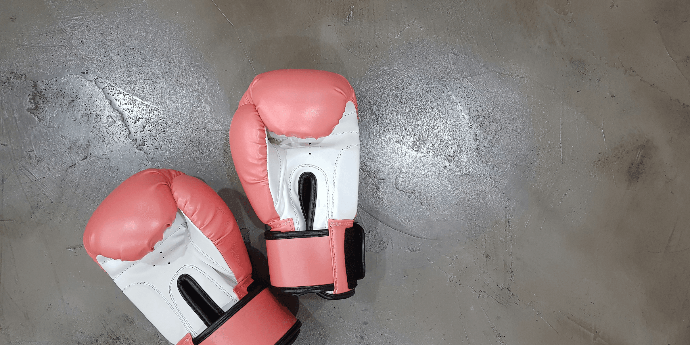 pair of pink boxing gloves.