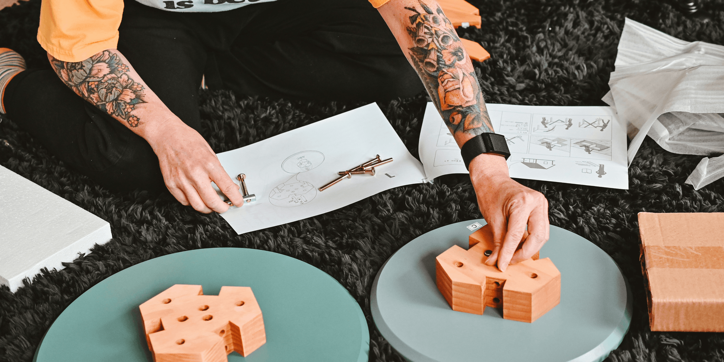 a person painting on a table.