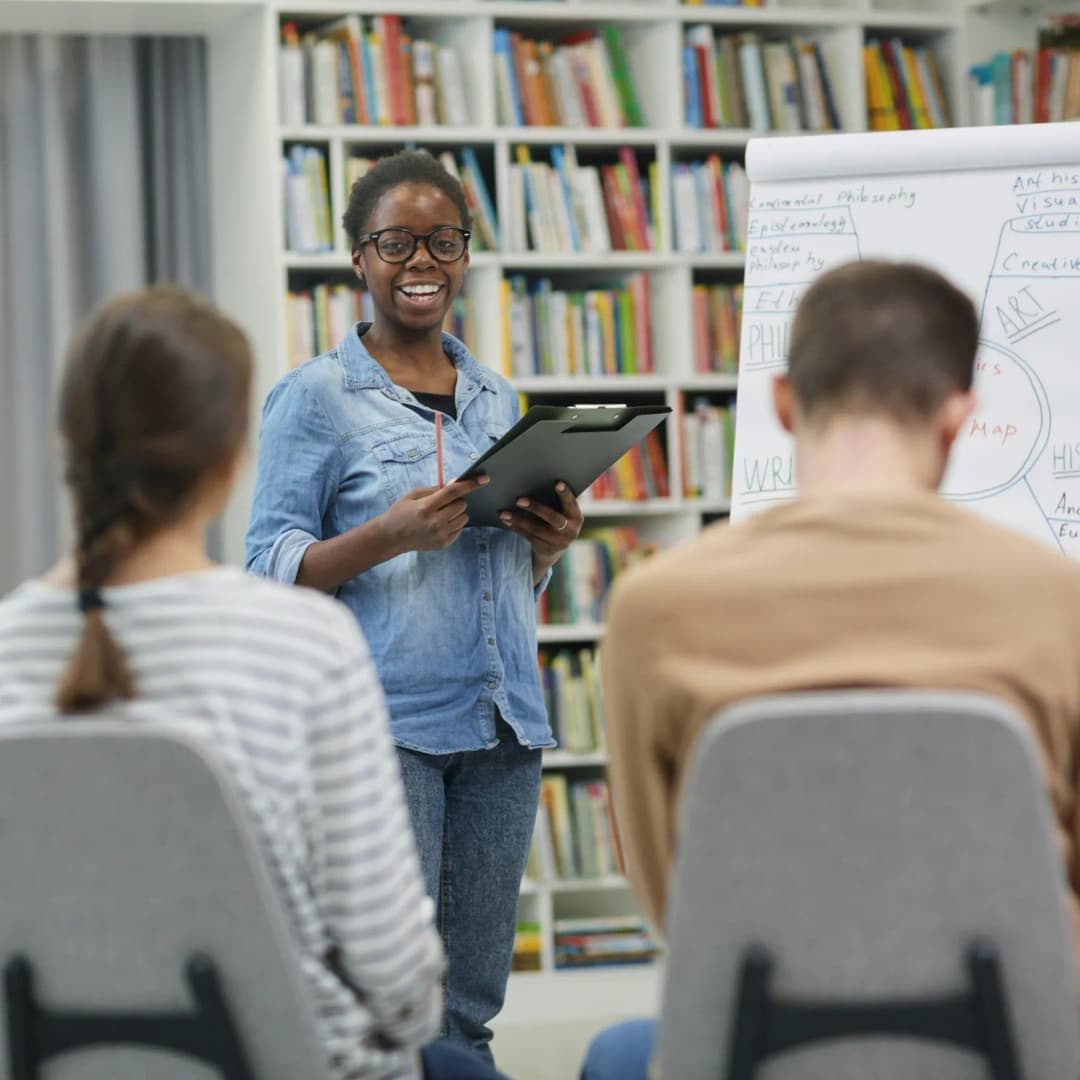 Diverse group of colleagues celebrating success in office