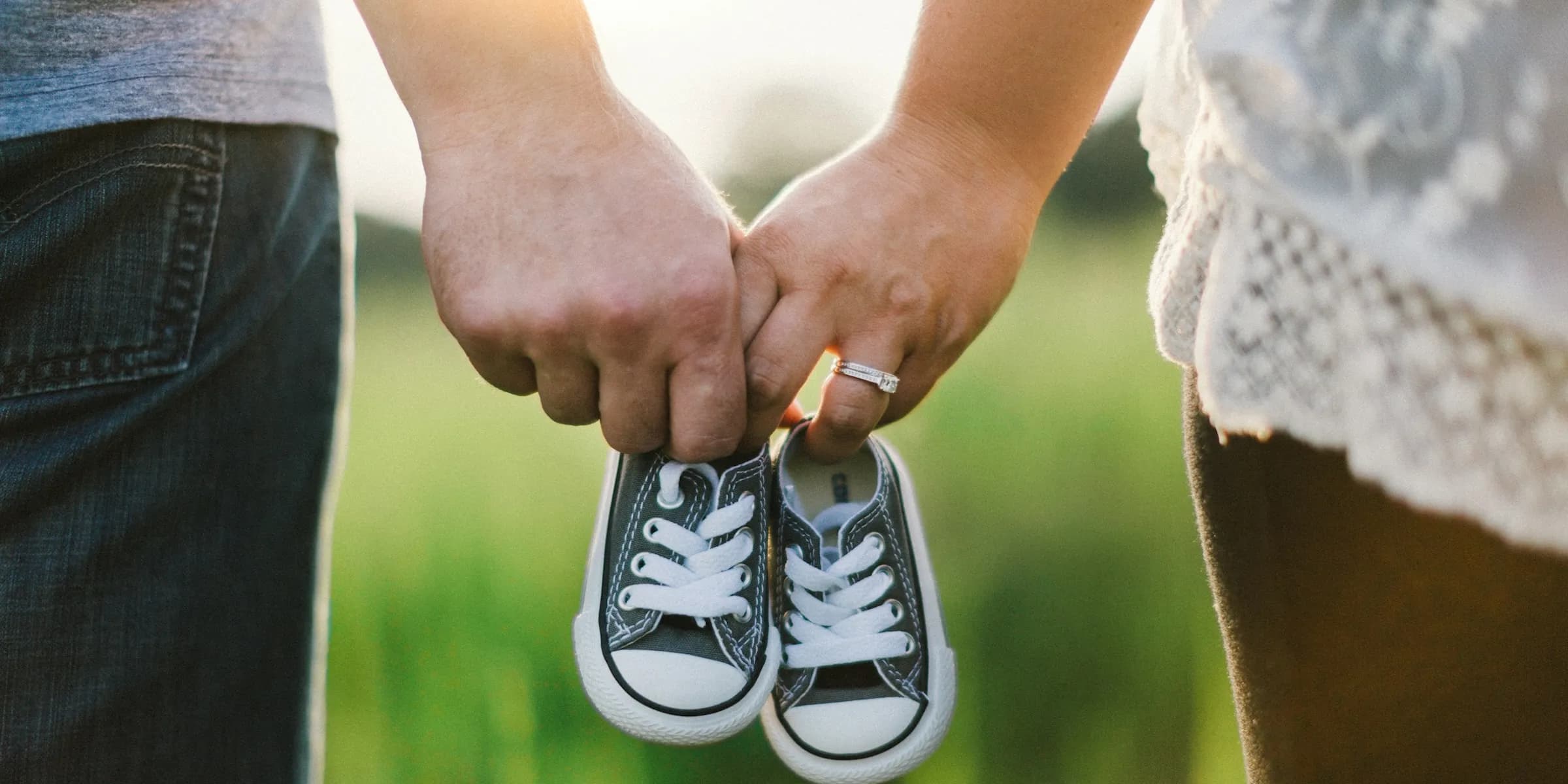 a couple holding a pair of shoes