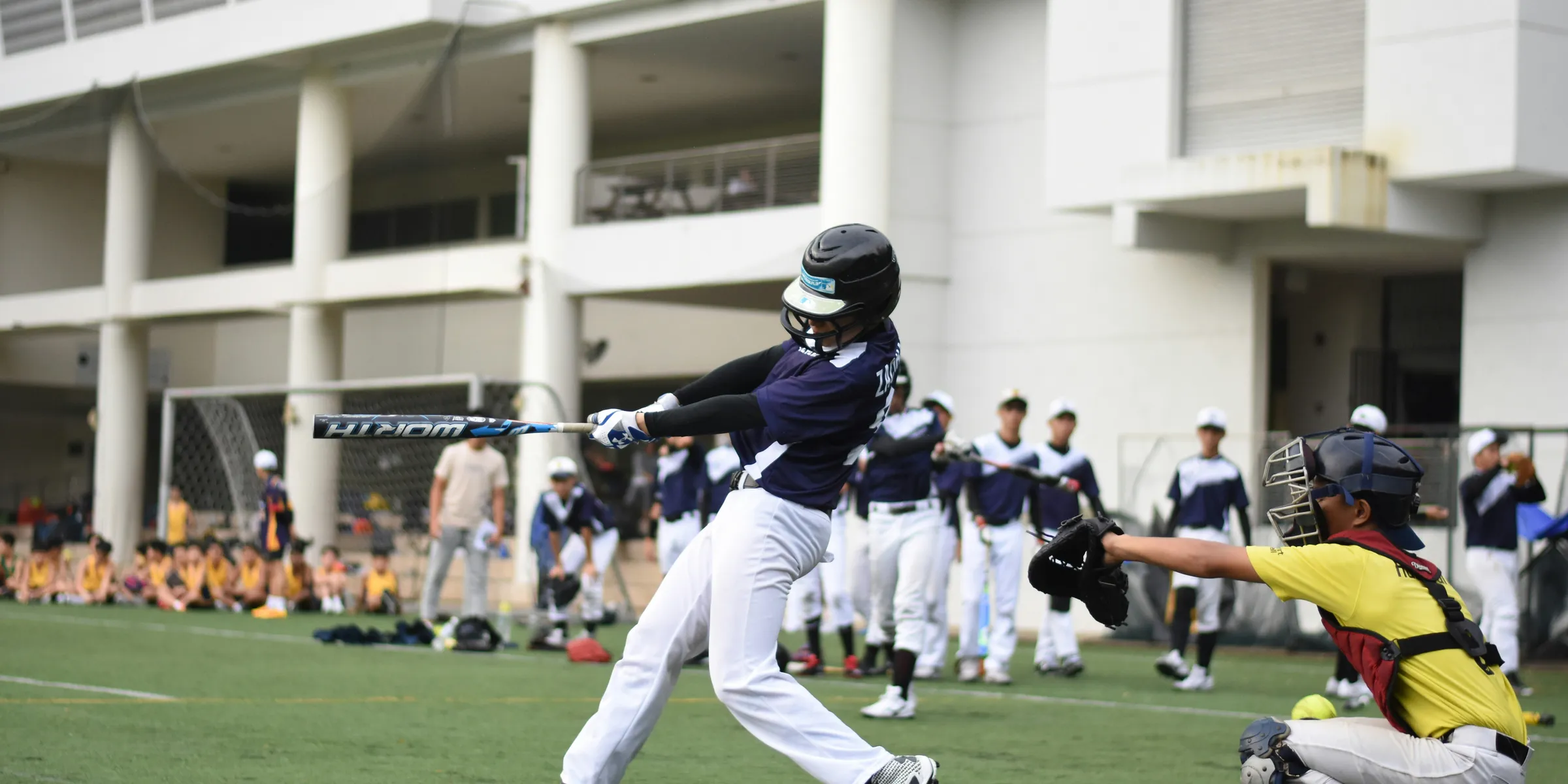 baseball players playing baseball on baseball field
