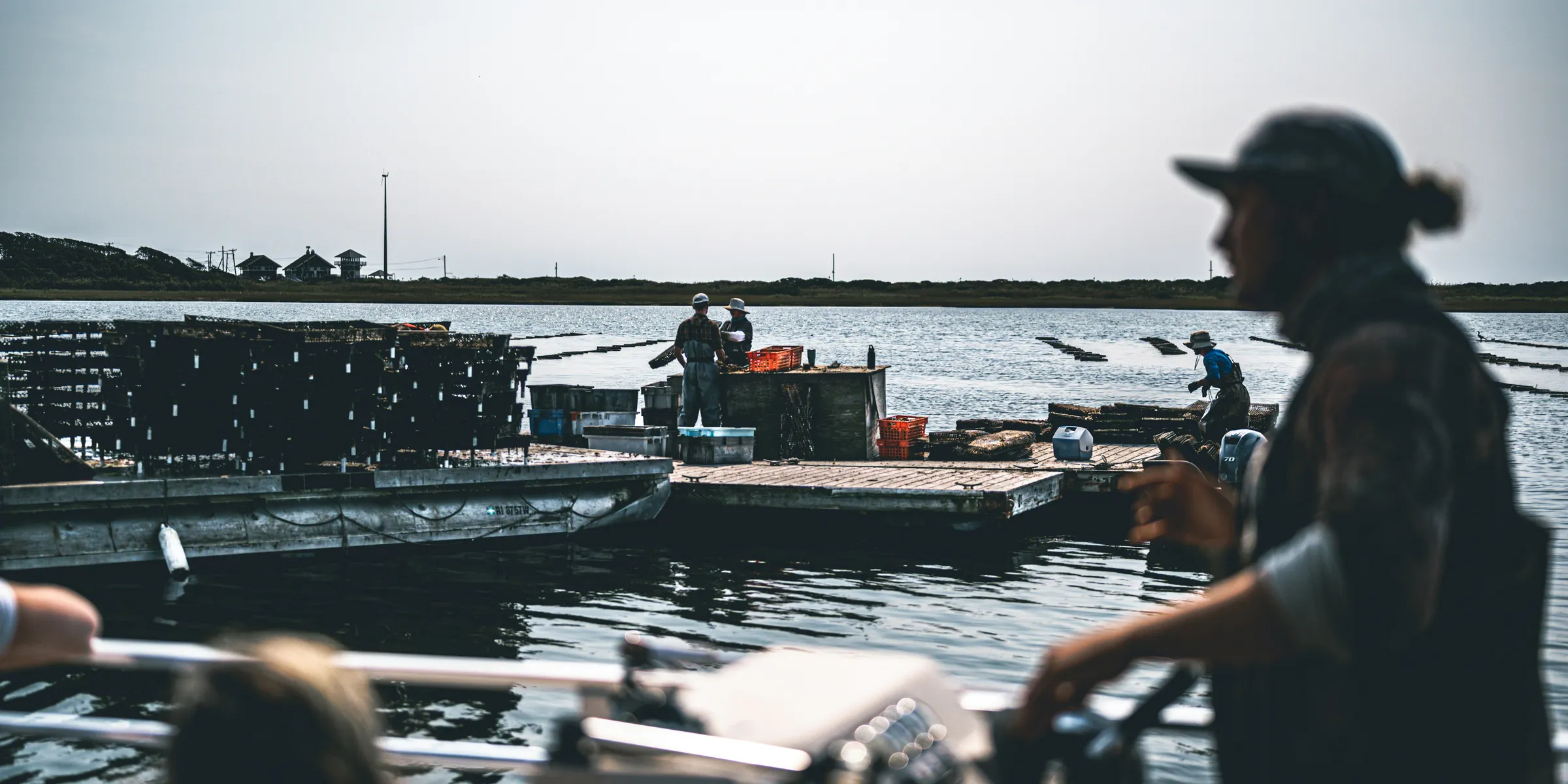 a group of people on a boat in the water