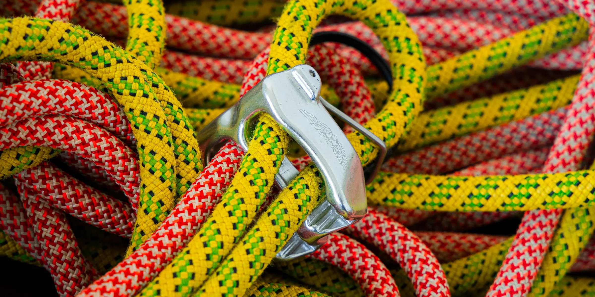 yellow and red rope on silver belt buckle
