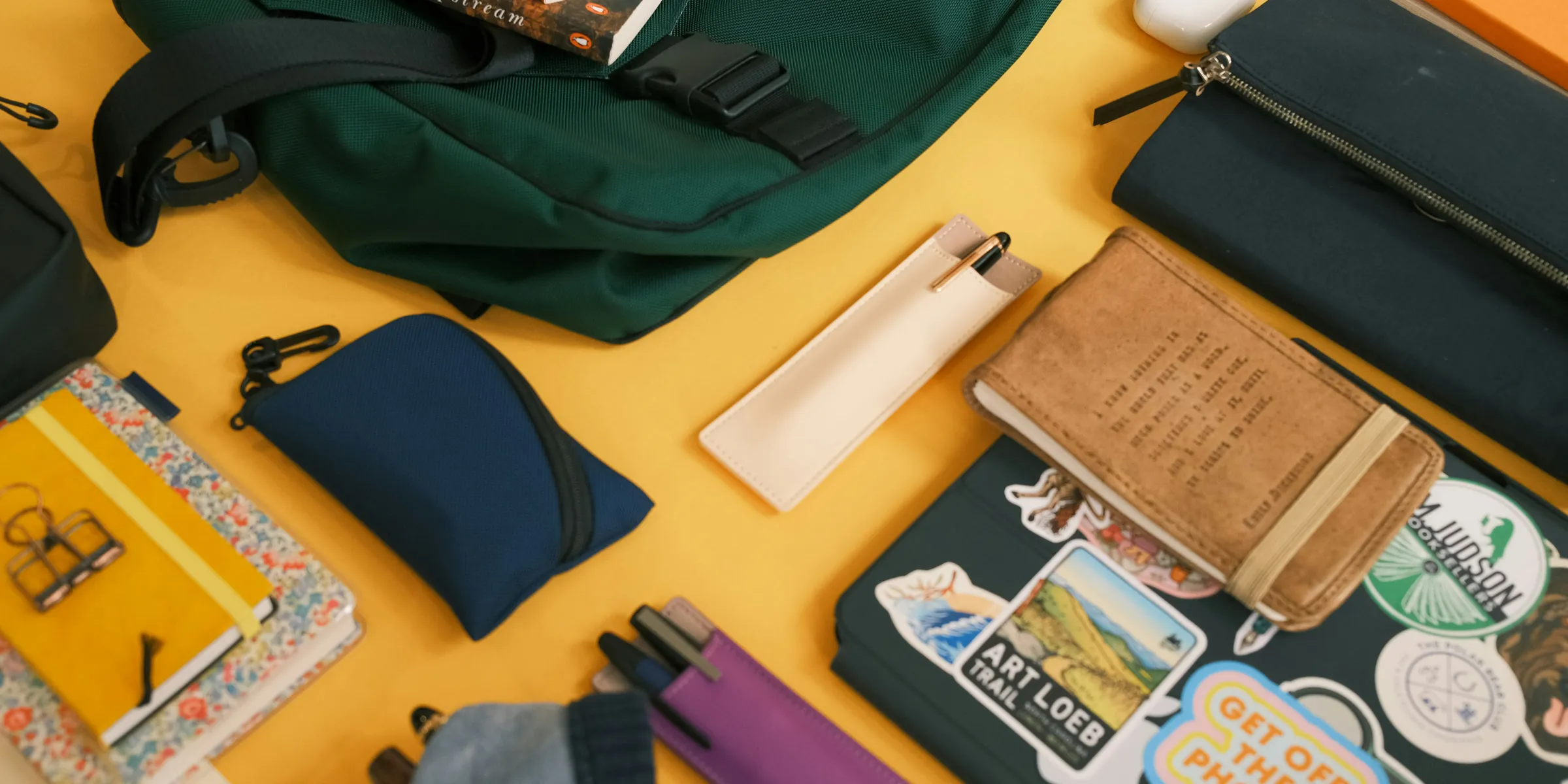 the contents of a backpack laid out on a table