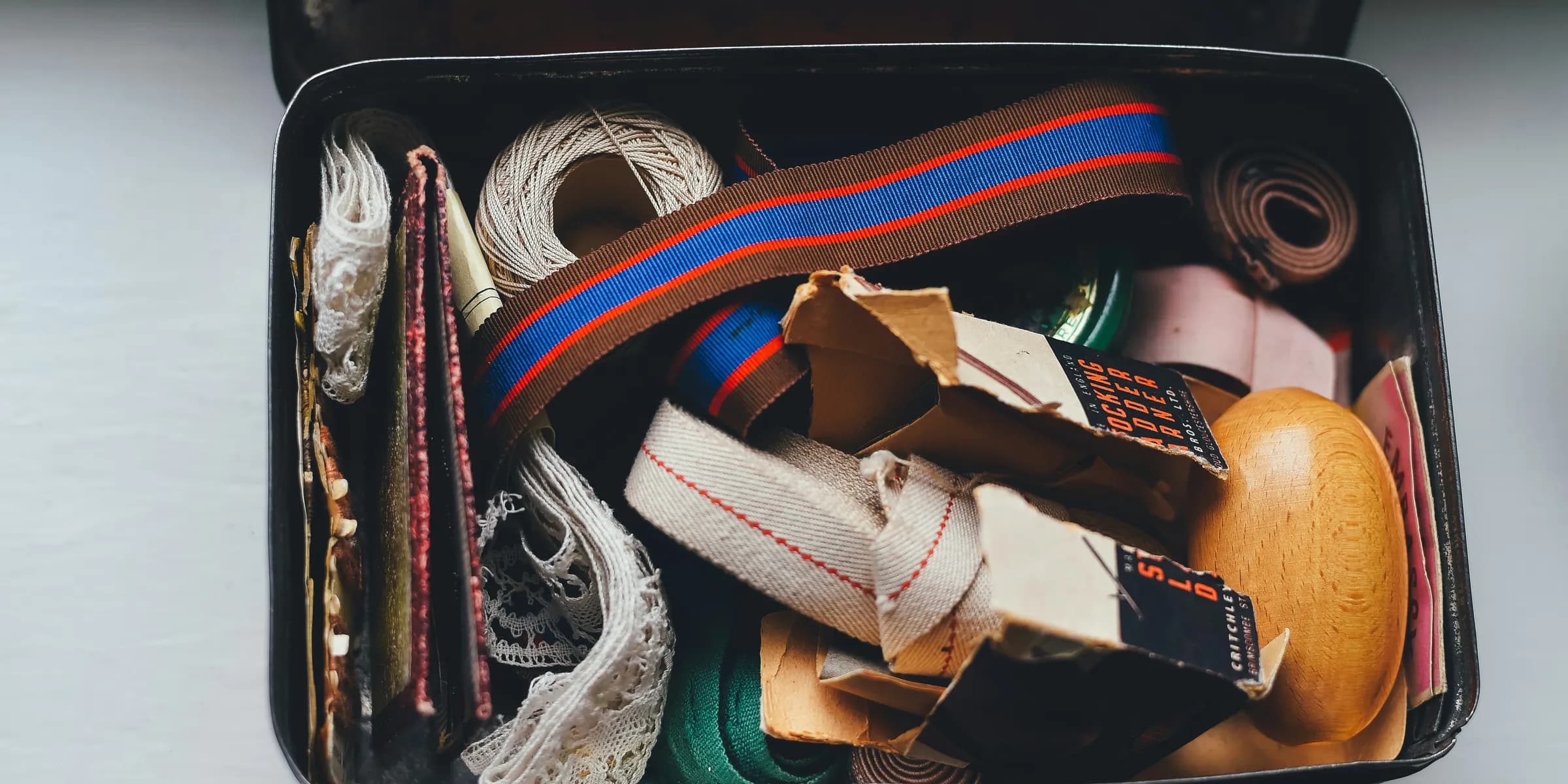 assorted belts and packs on metal case