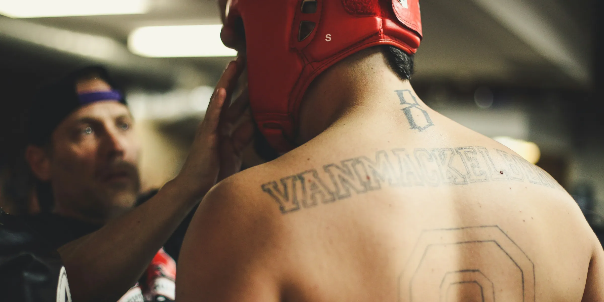 person using training helmet inside the ring