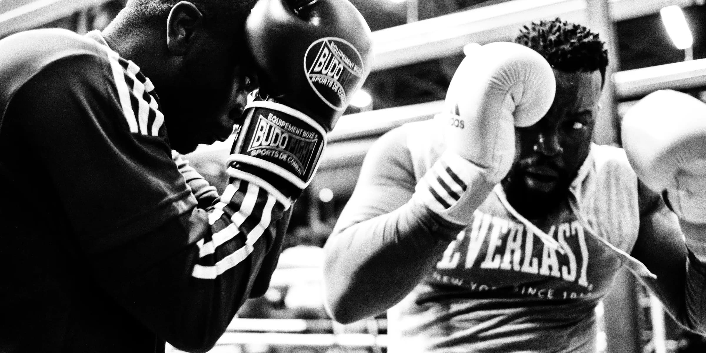 two men wearing boxing gloves