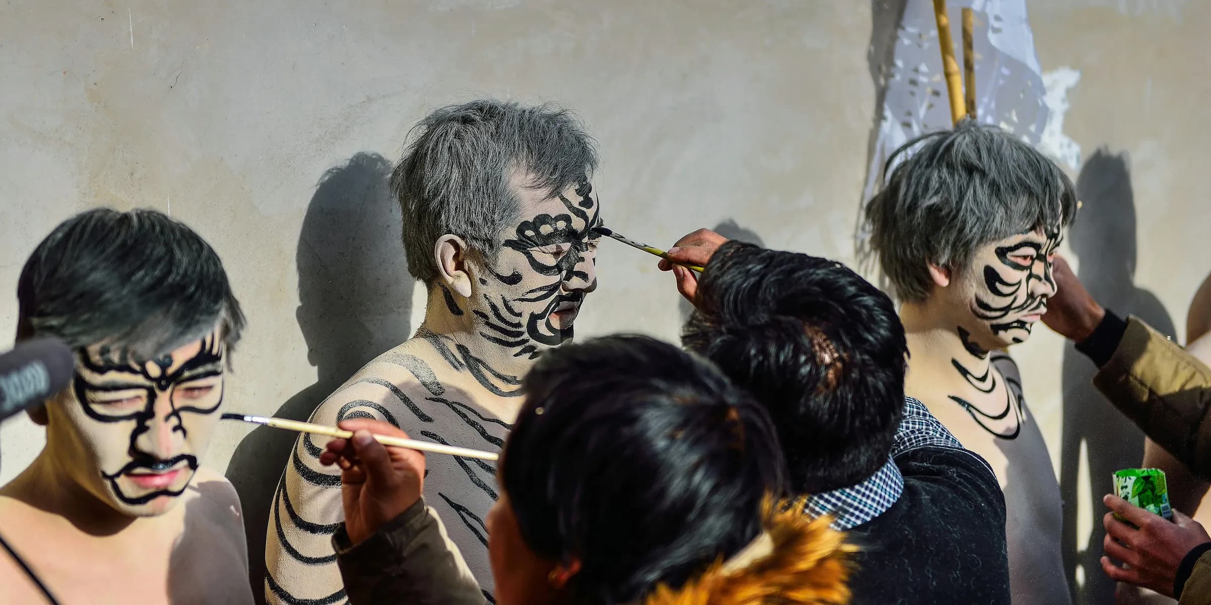 a group of people with paint on their faces