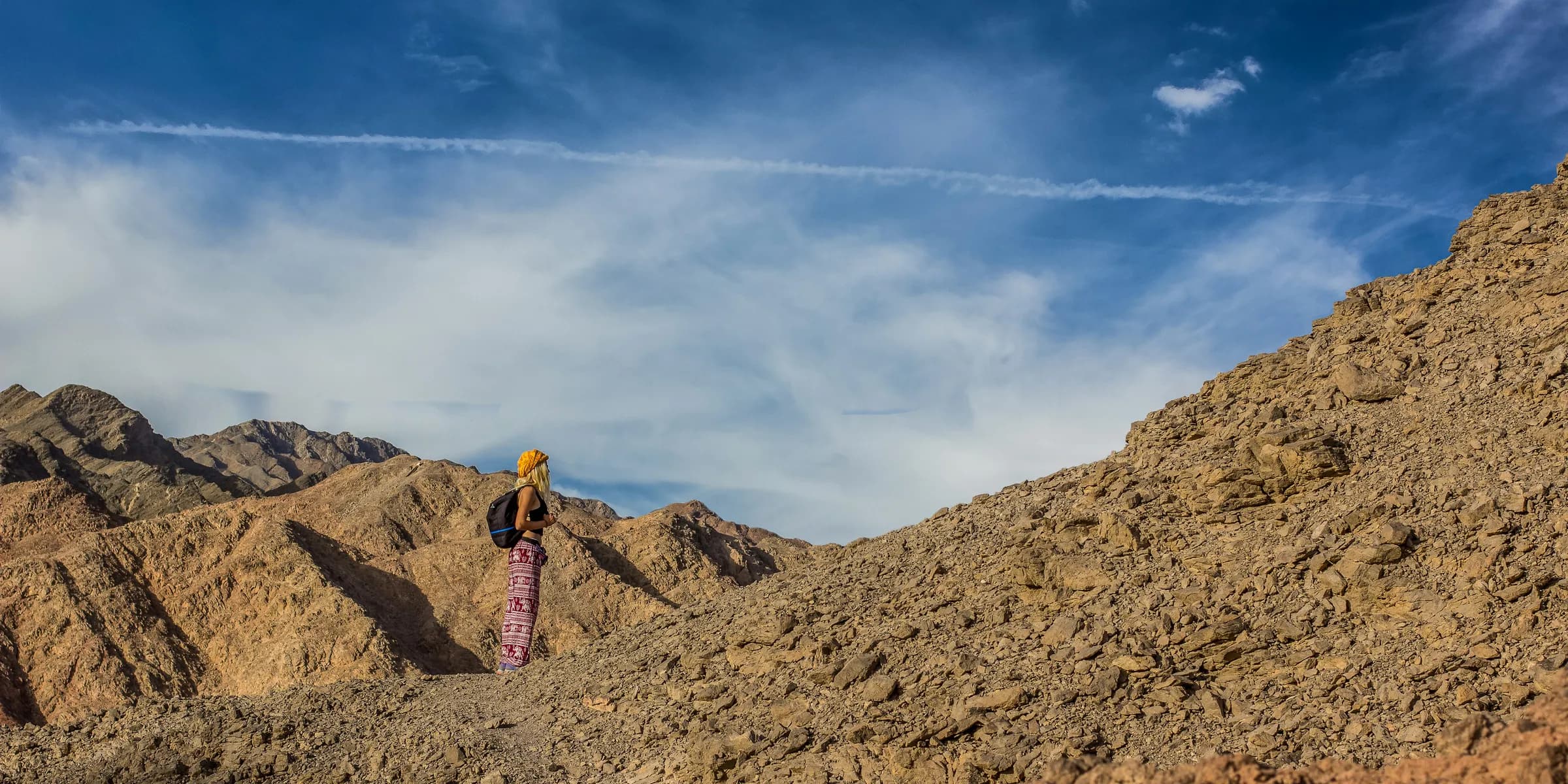 a person standing on top of a mountain
