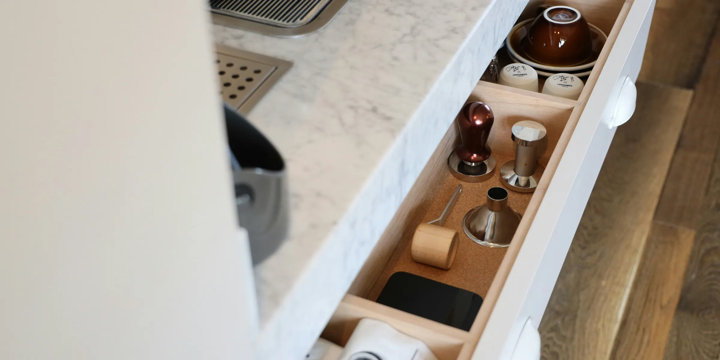 brown glass bottles on brown wooden rack