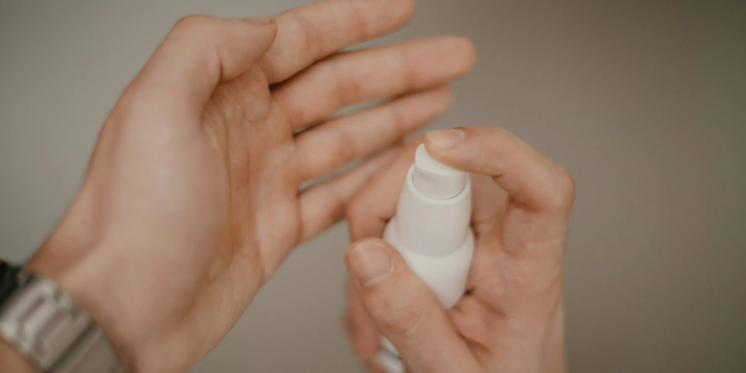 person holding bottle