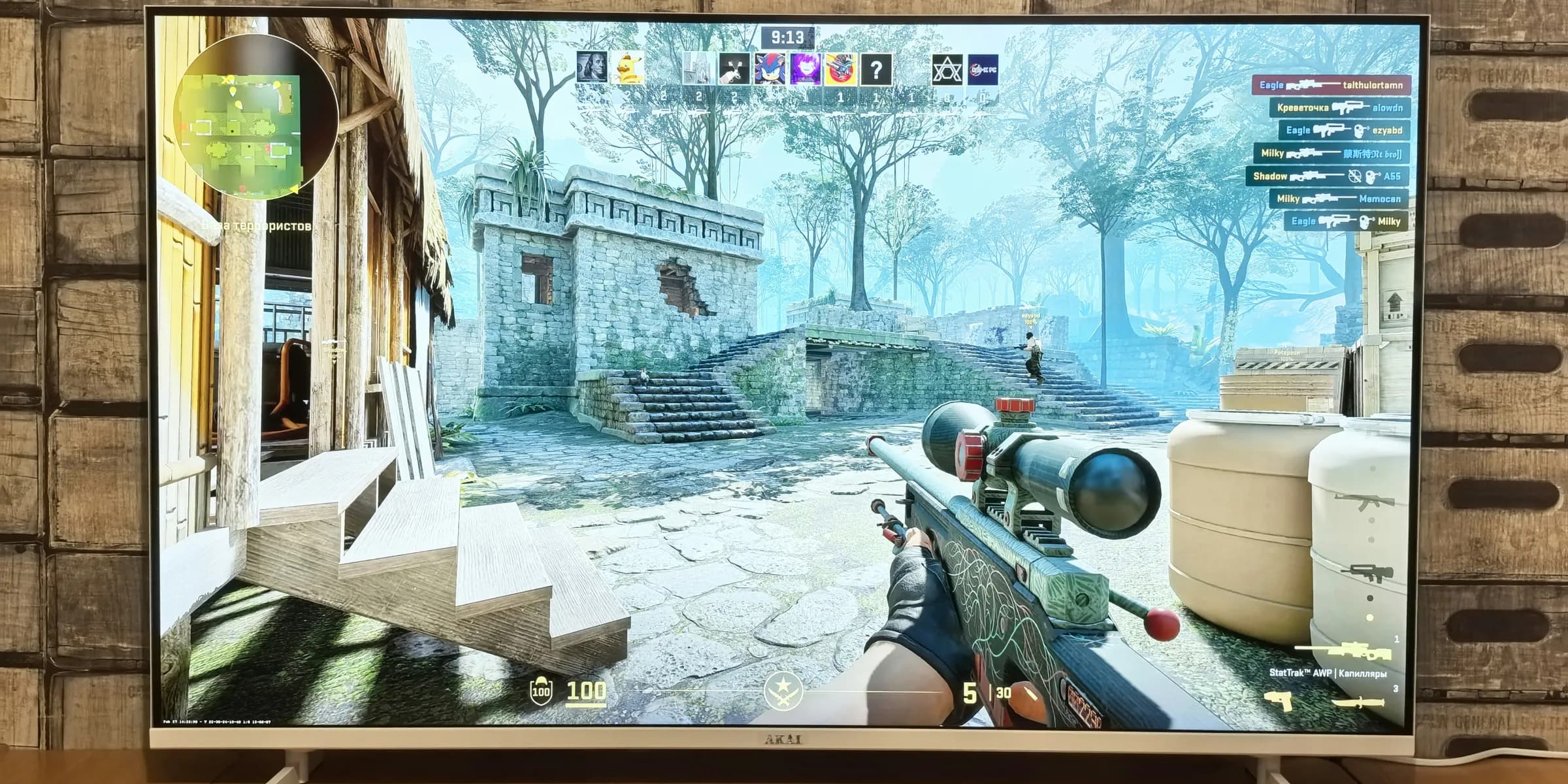 Television screen displaying a first-person shooter video game.