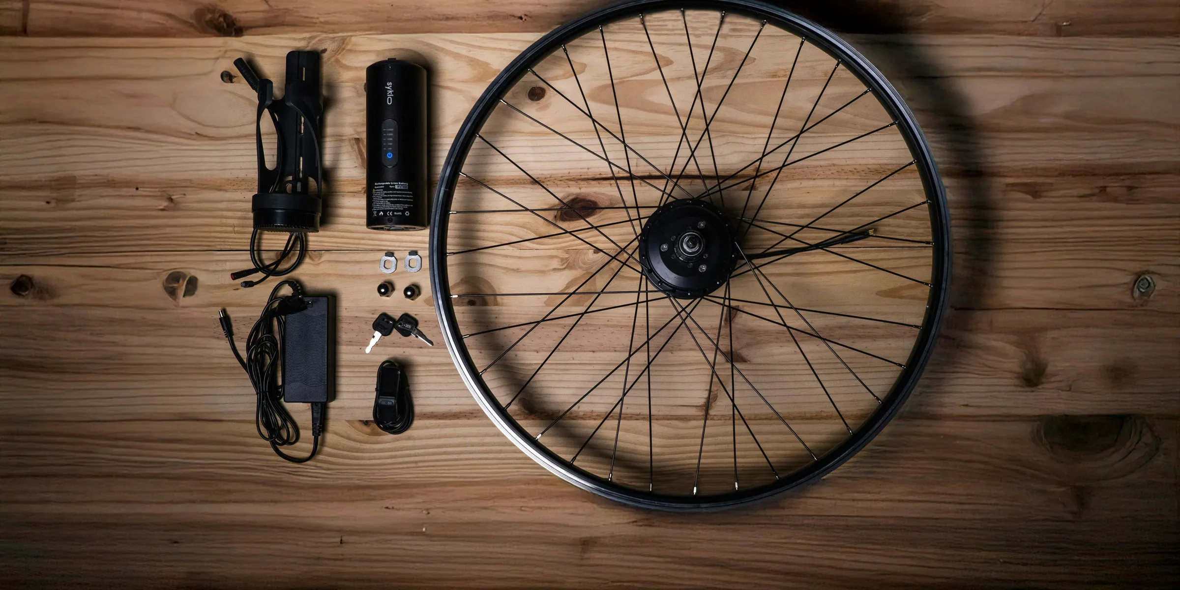 Electric bicycle conversion kit components laid out