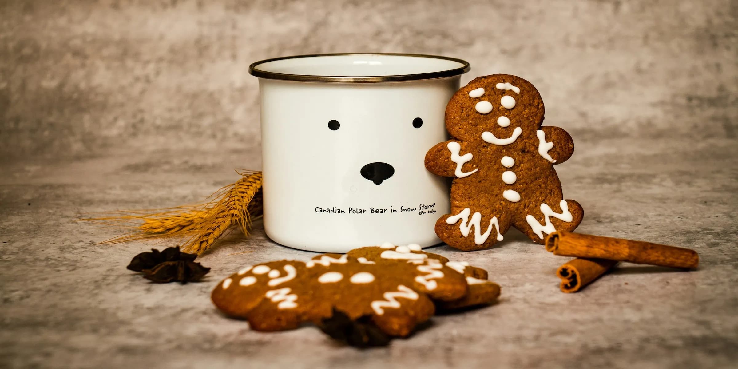 holiday cookies laying near a mug