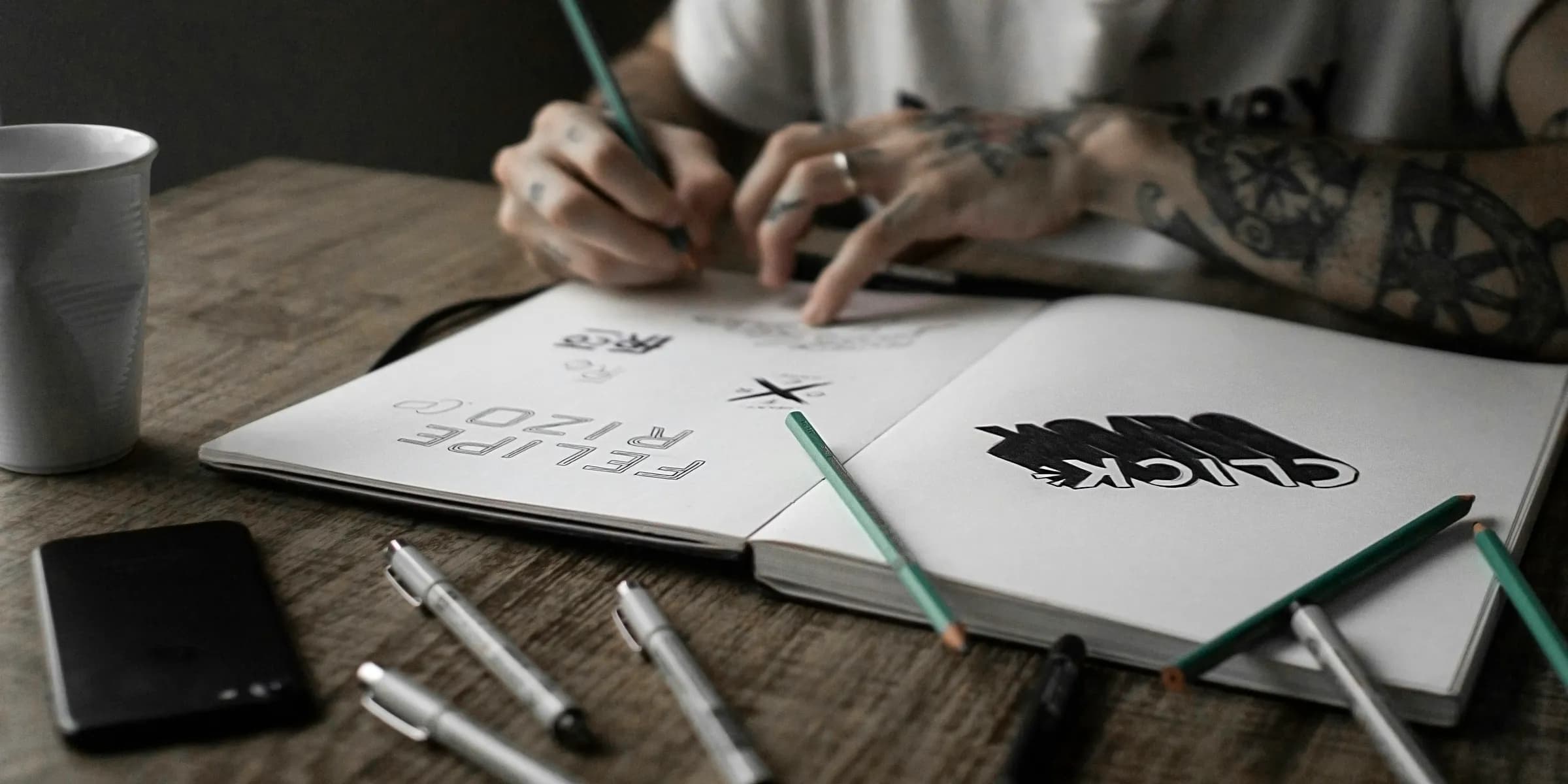 person writing on book