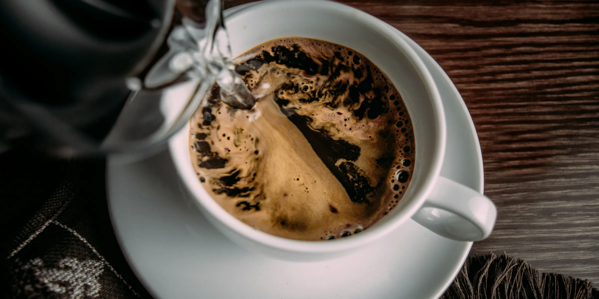 white ceramic mug with coffee