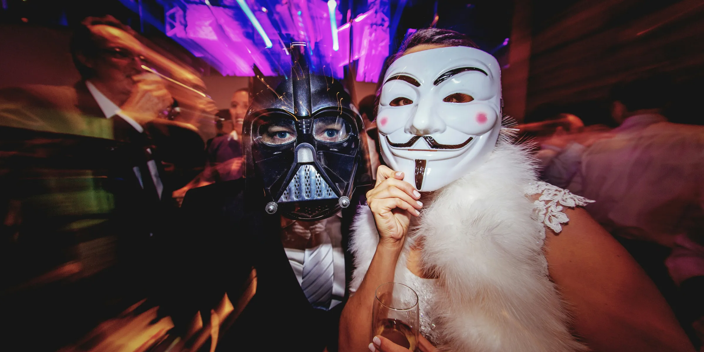 a couple of people that are wearing masks