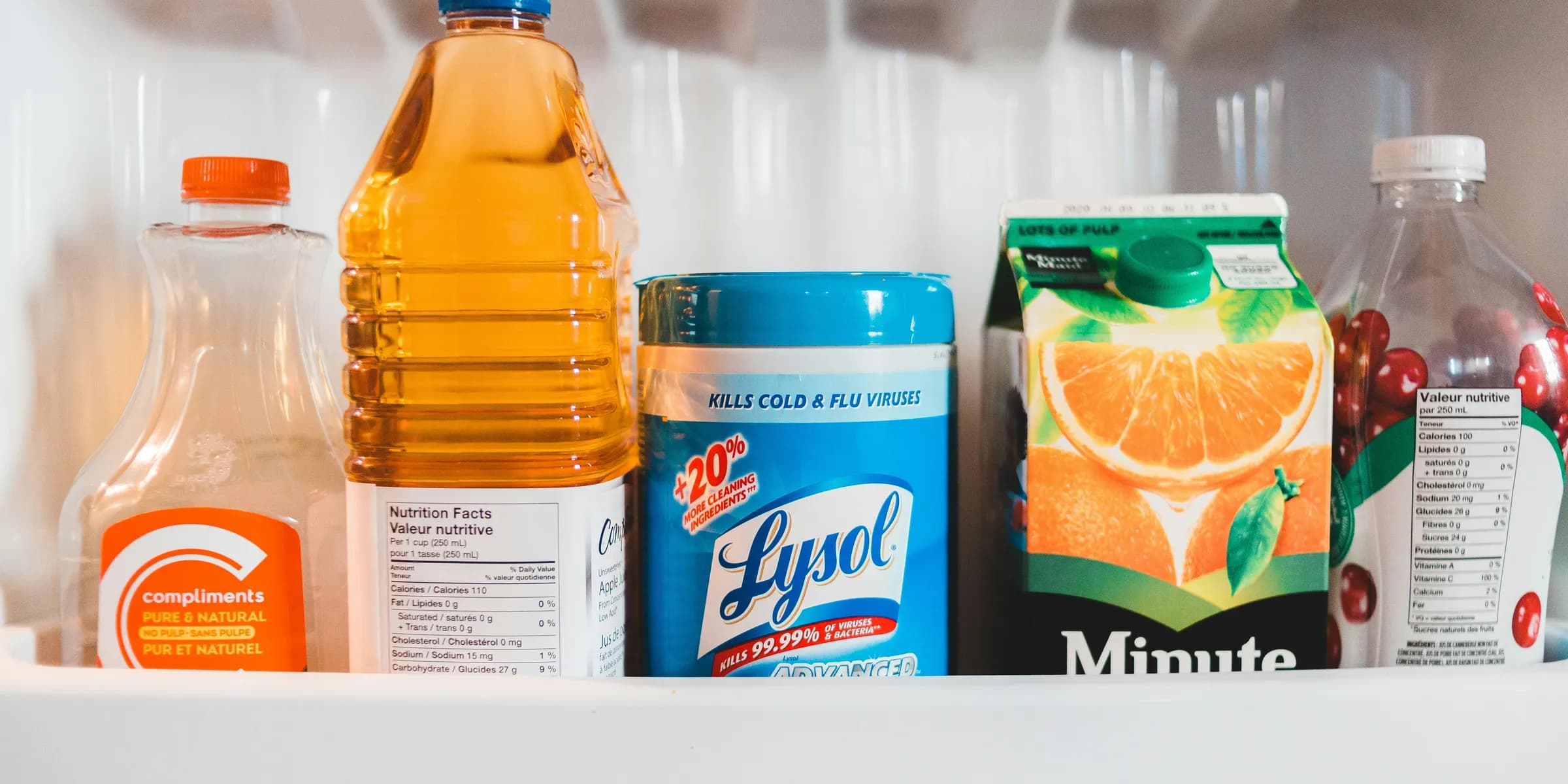 a refrigerator filled with lots of different types of drinks