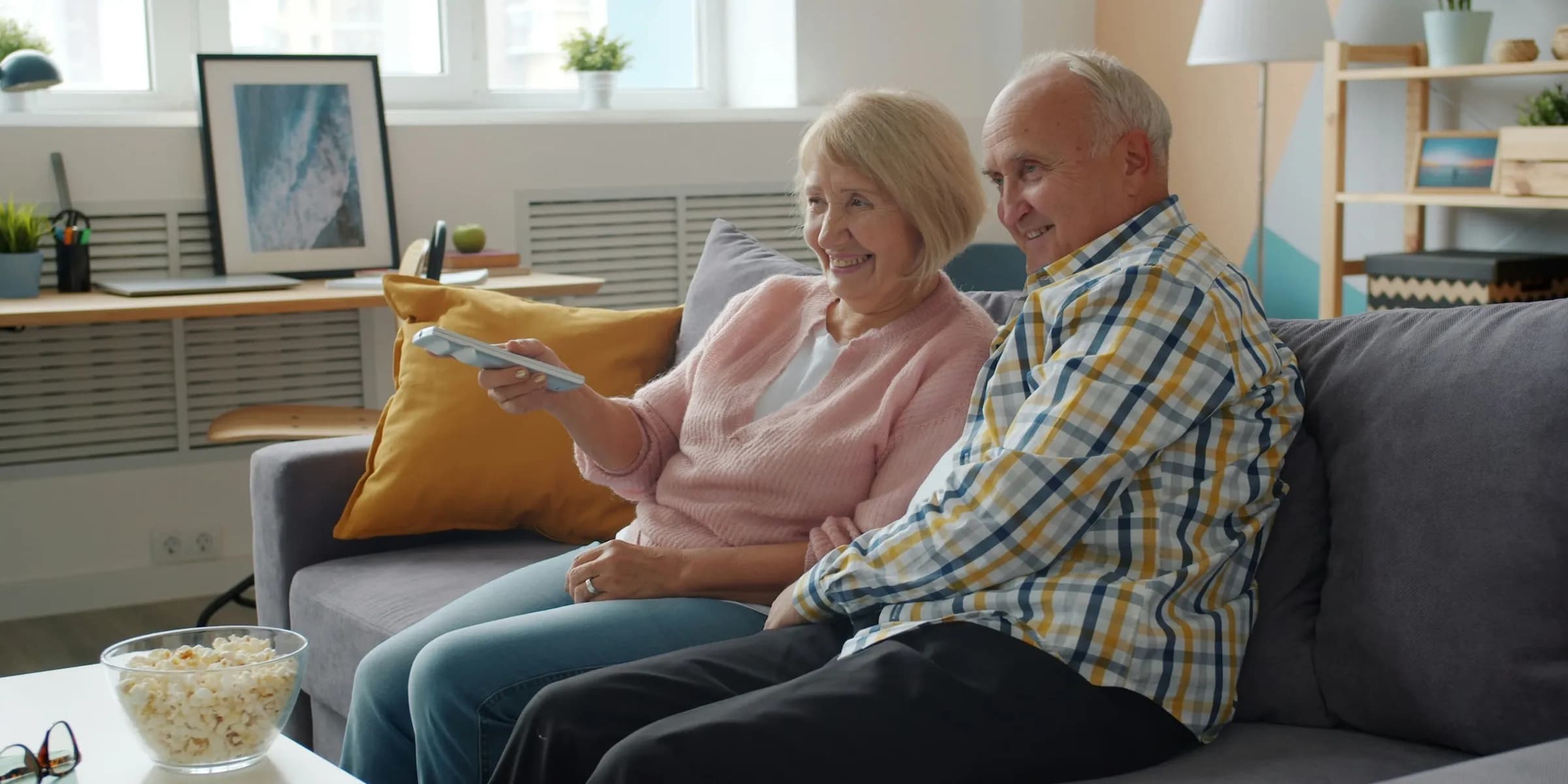 couple watching tv at home
