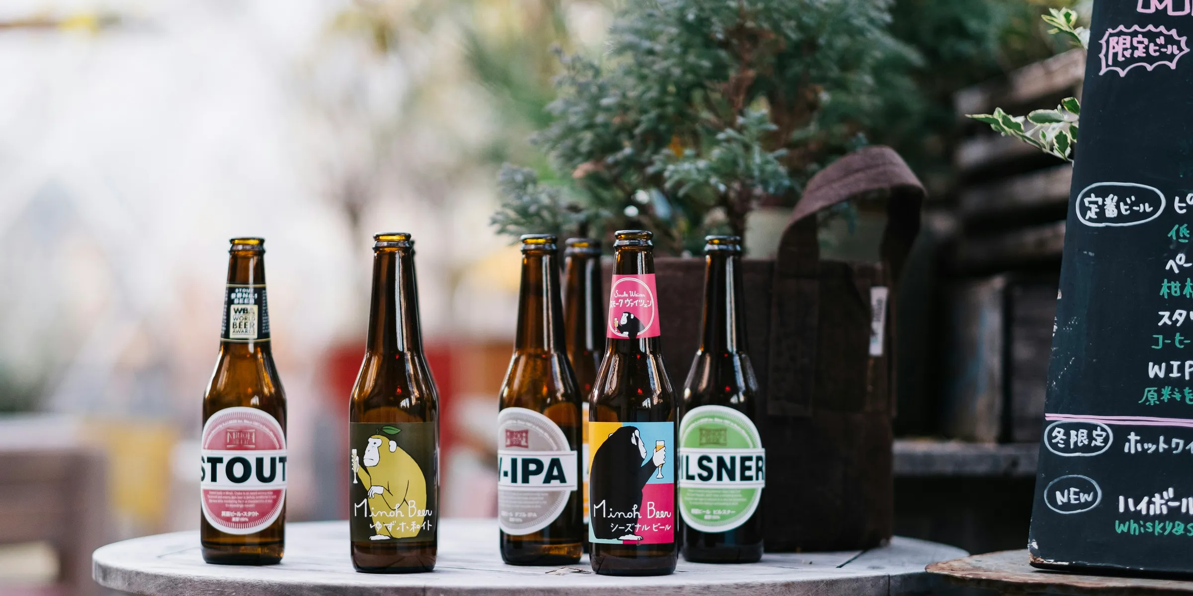 six label bottles on top of round table