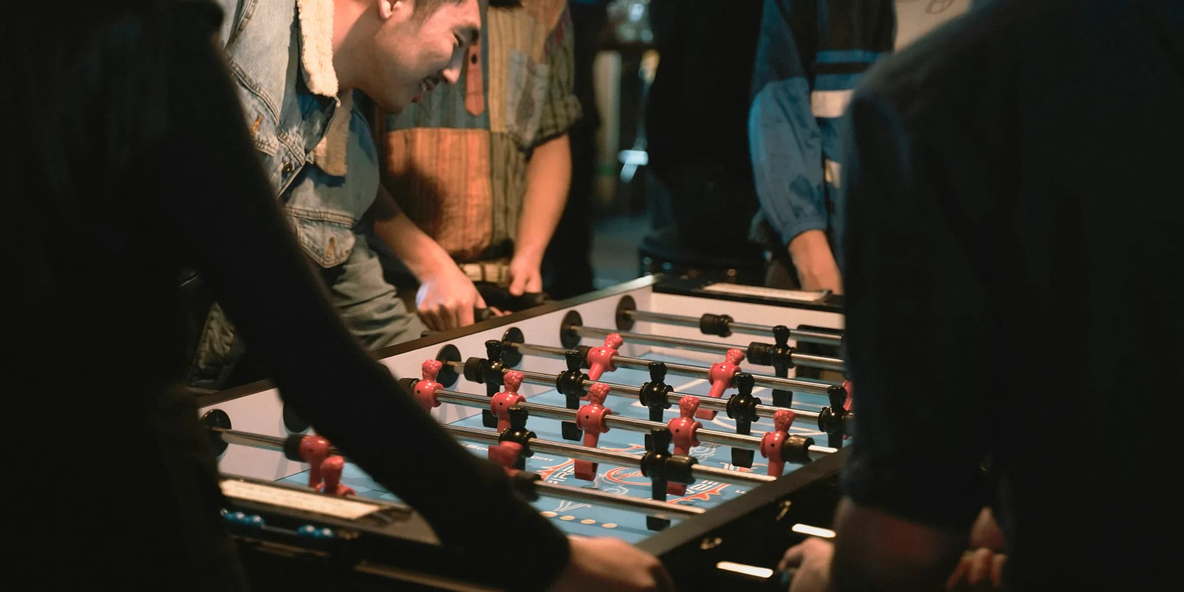 a group of people playing a game of foo foo