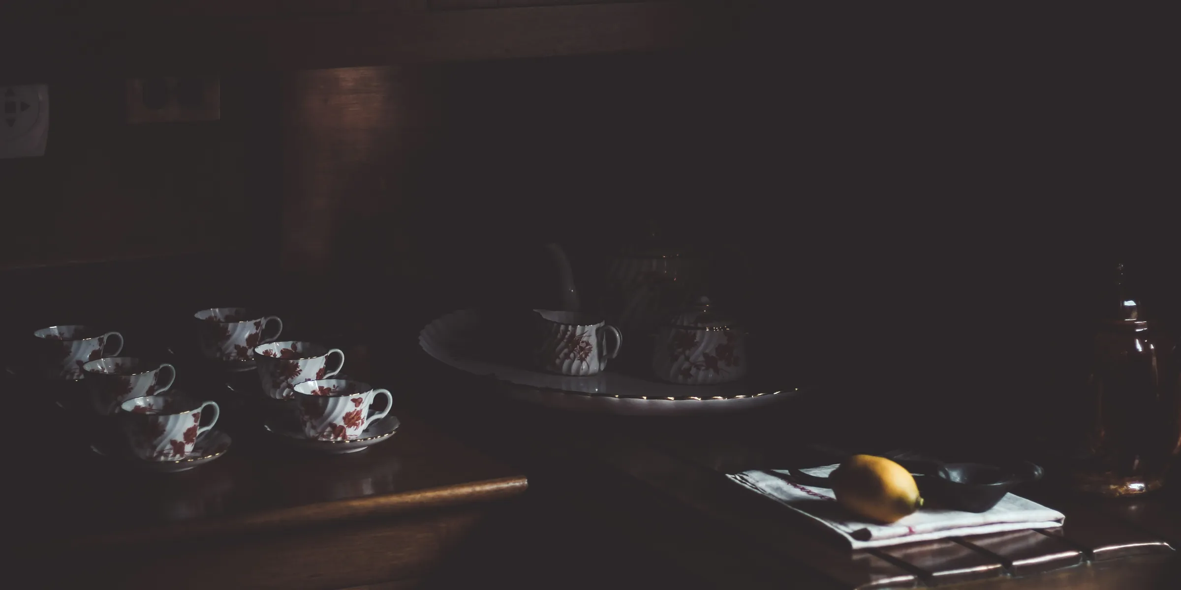 black round plate on brown wooden table