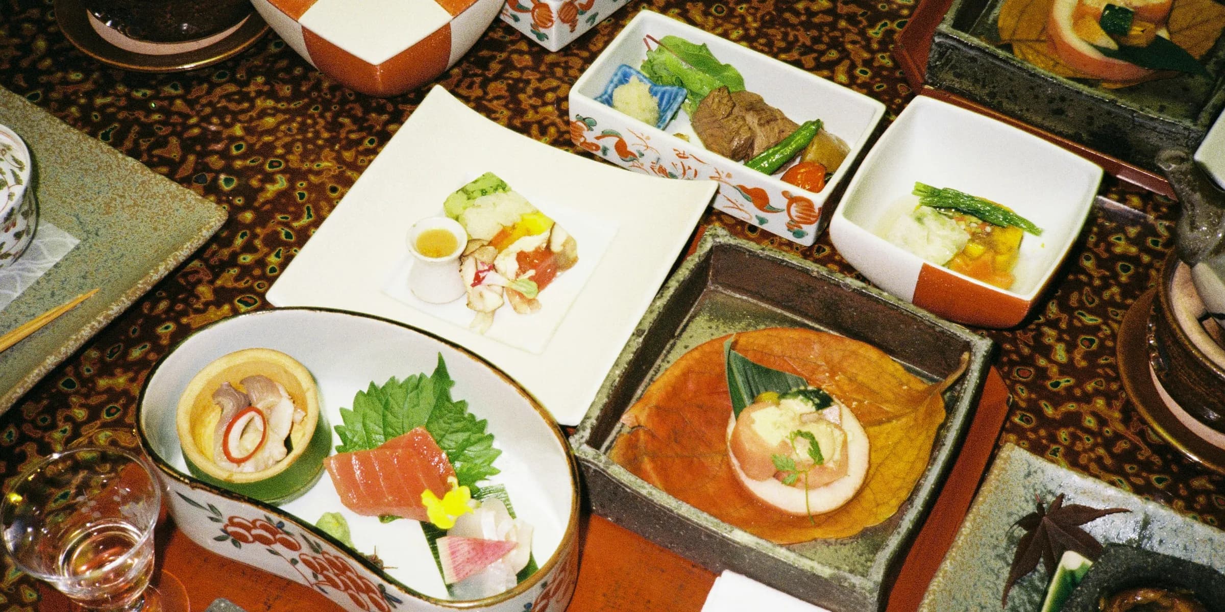 a table topped with lots of different types of food