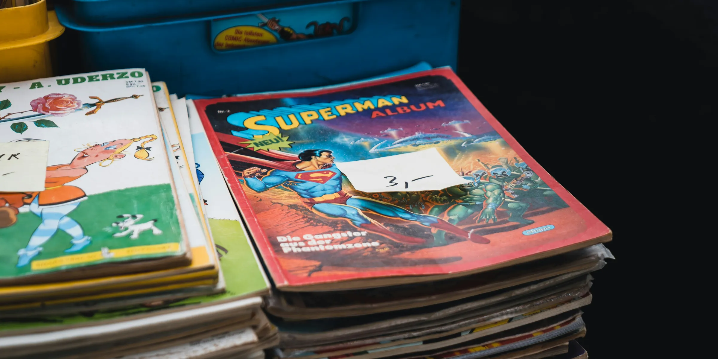 a stack of children's books sitting on top of a table