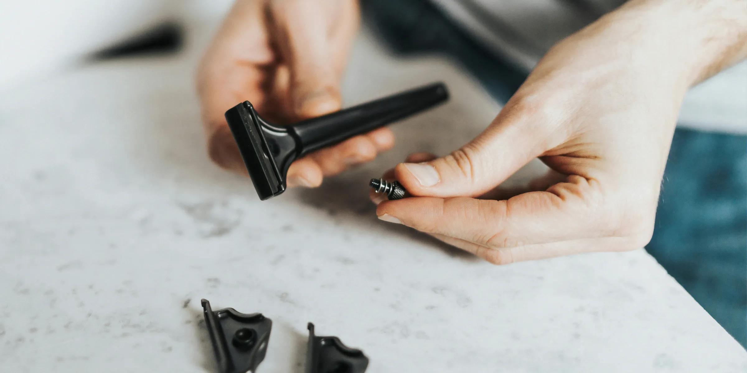 person standing while fixing shaver